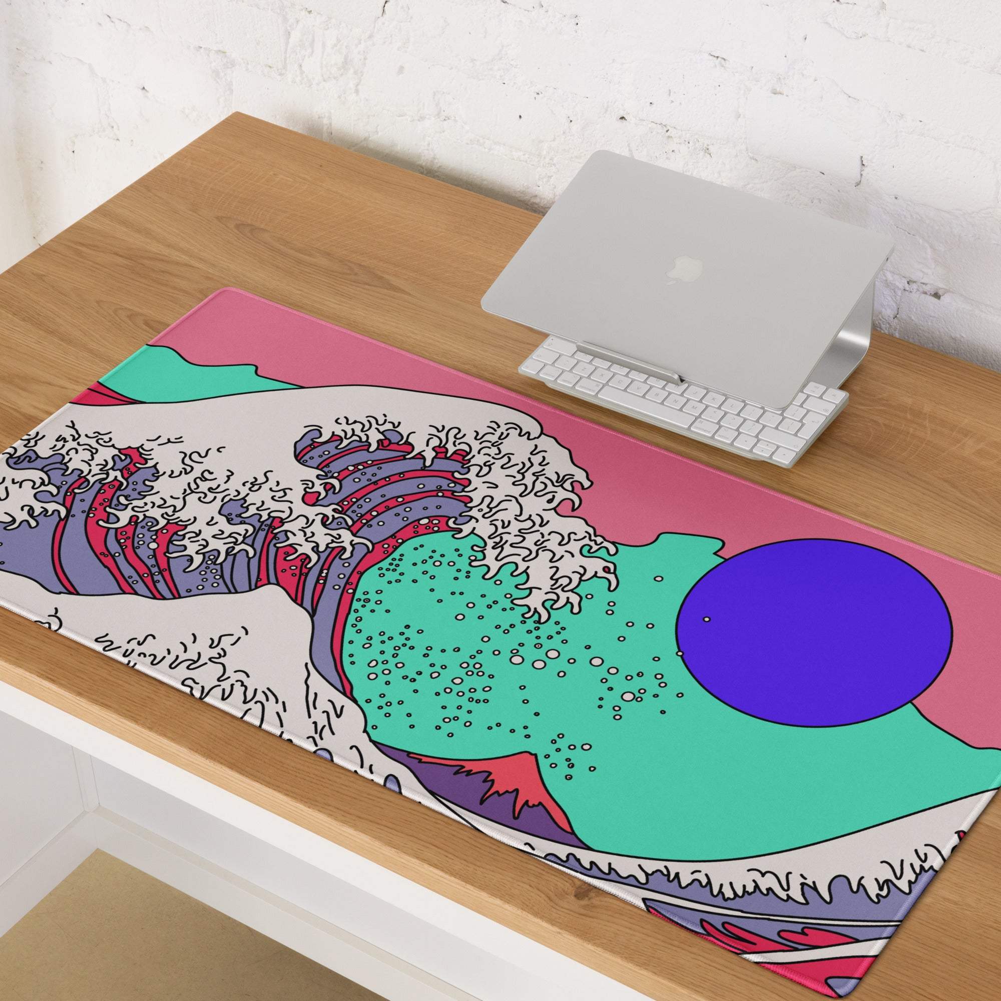 Vibrant retro-style wave-patterned pink teal purple gaming mousepad on smooth surface for esports and digital art use