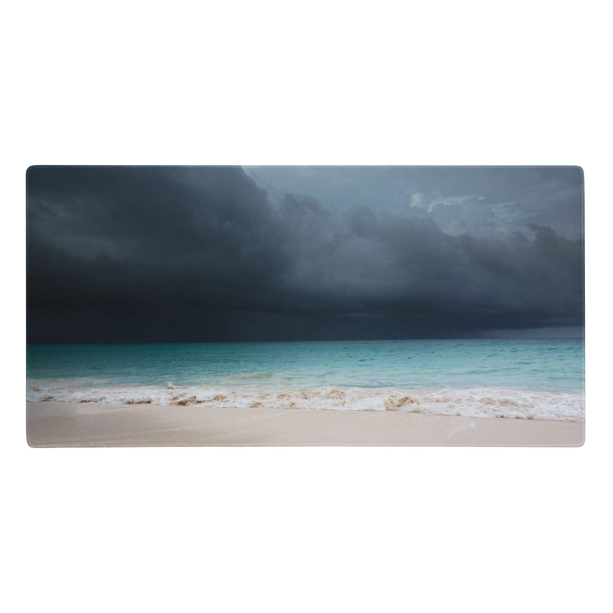 Rectangular desk mat mouse pad with stormy ocean vista dark storm clouds turquoise water and white waves on sandy shore