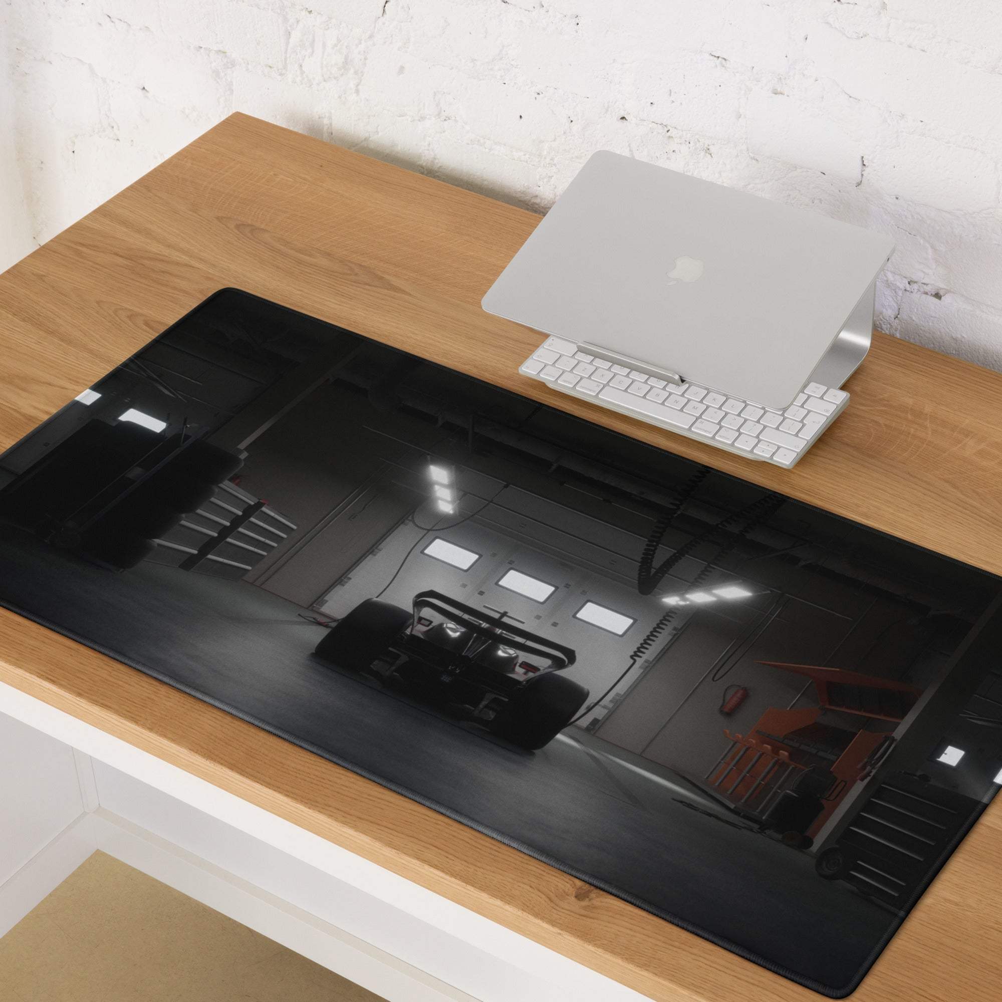 Racecar black gaming mouse pad with glossy finish and monochrome industrial interior print non slip stitched edge