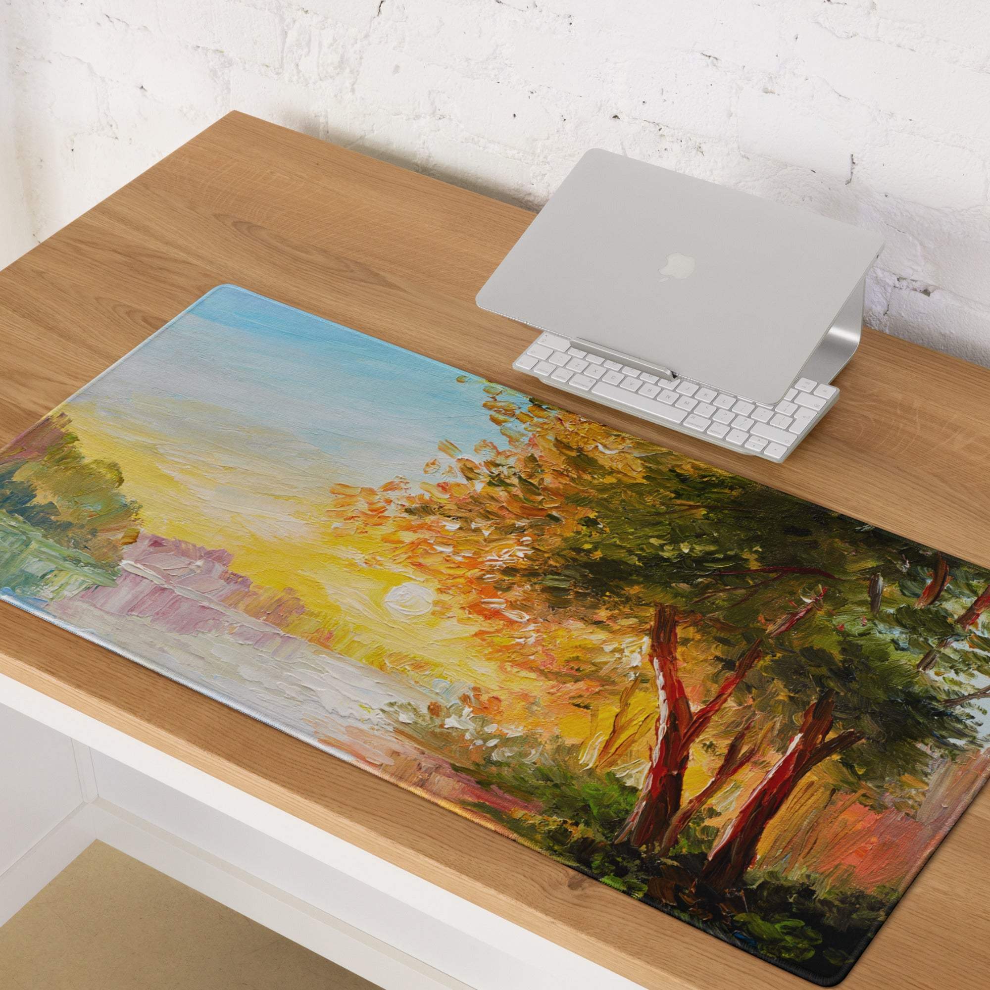 Rectangular desk mat featuring a vibrant impressionist autumn landscape with golden sunlight and soft pastel skies for gaming decor