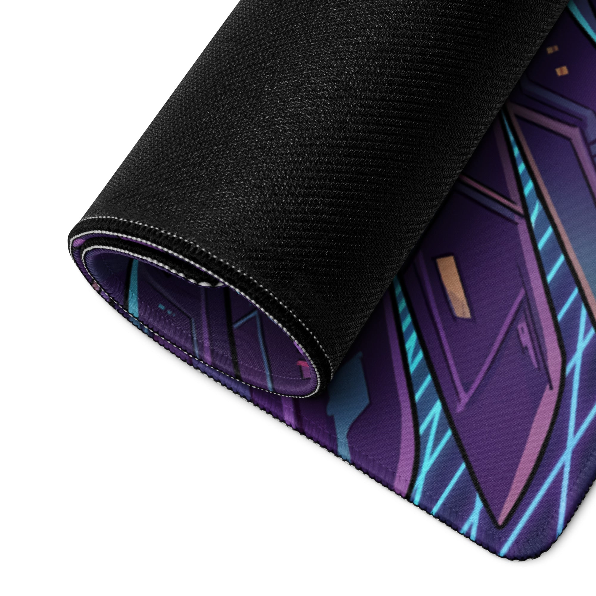 A rolled-up vaporwave winged neon mouse pad with vibrant purple teal geometric design and black fabric edges