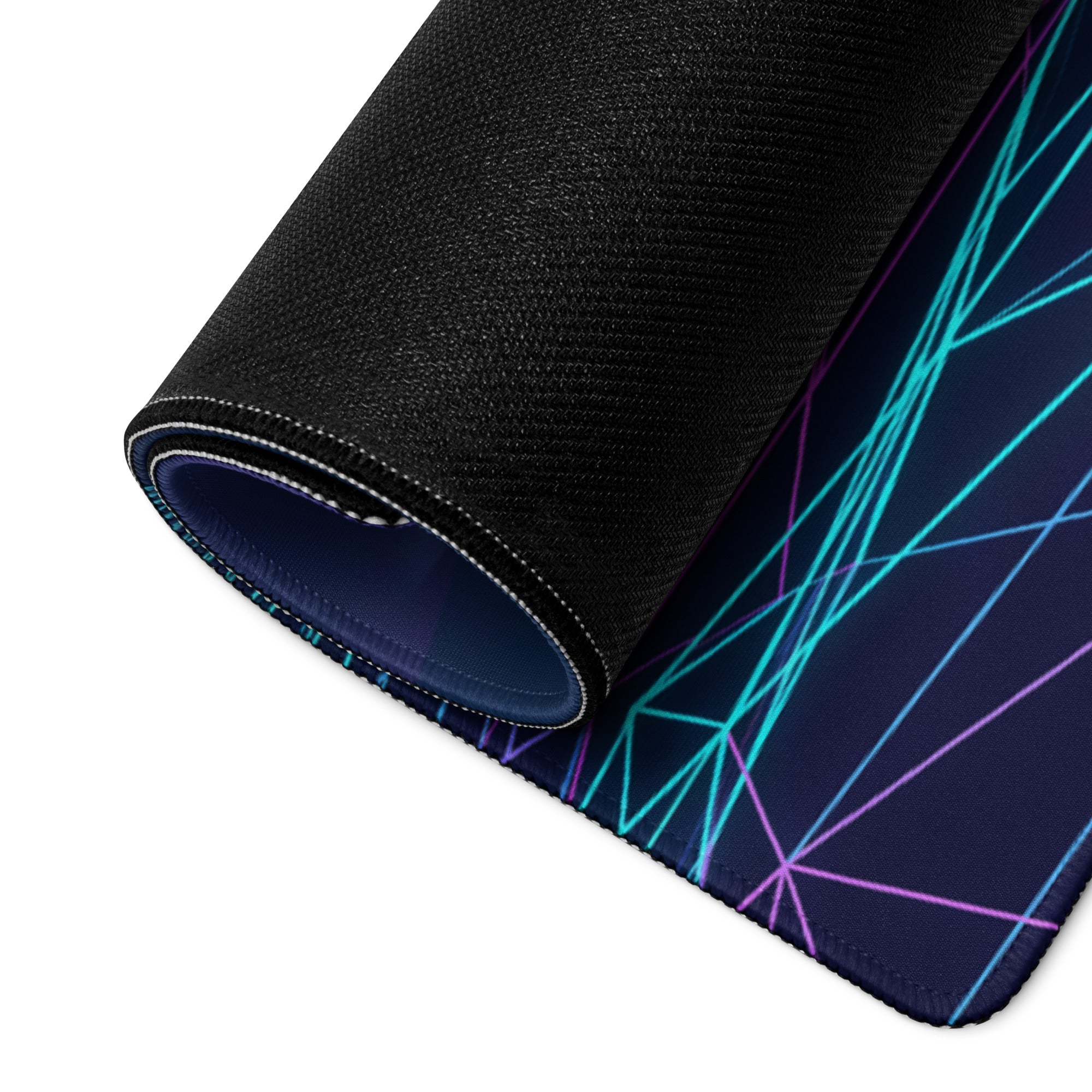 A rolled-up black gaming mousepad with vibrant cyan and purple geometric neon lines on a dark blue background