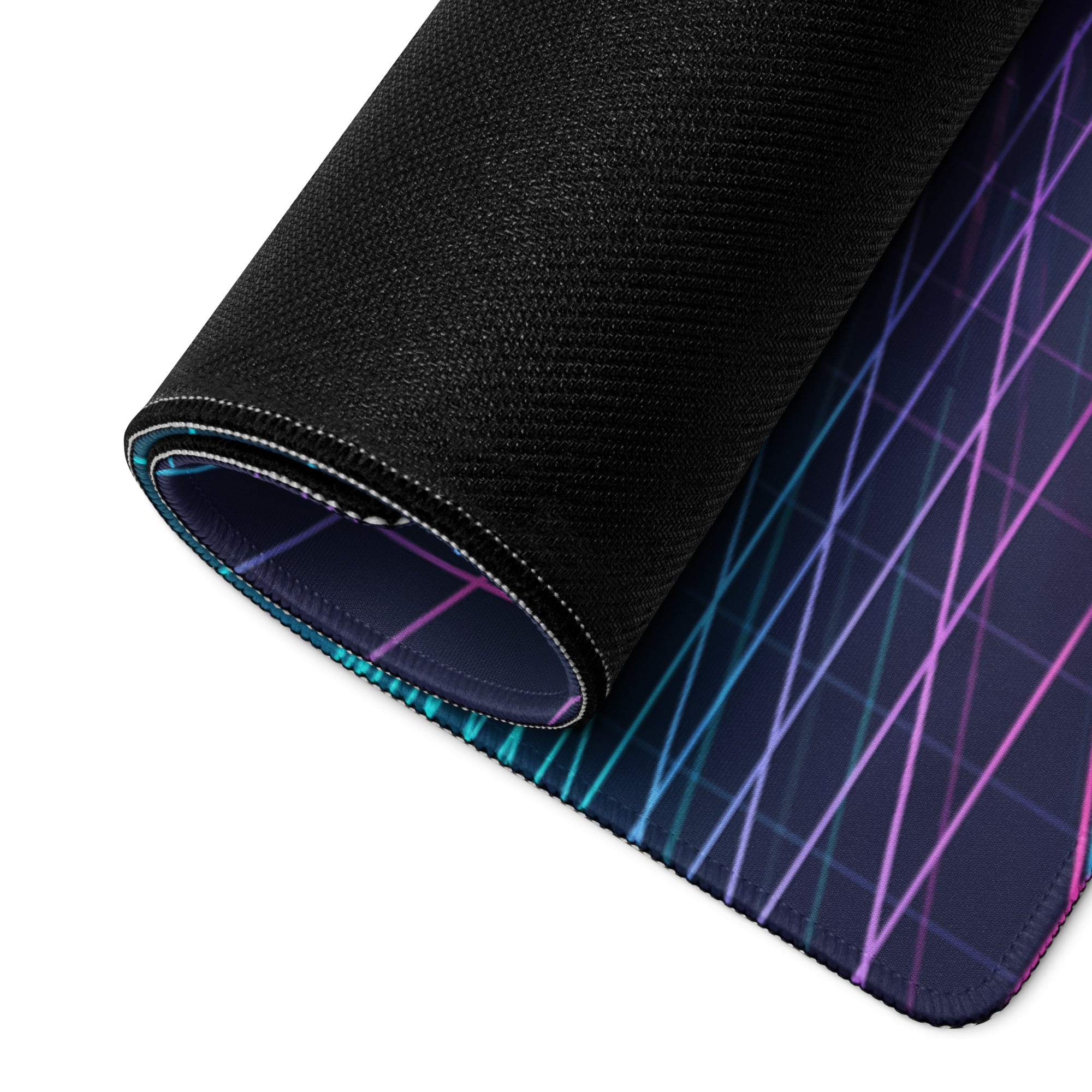A rolled-up black gaming mousepad with a vibrant purple and teal iridescent grid pattern for vaporwave cyberpunk use