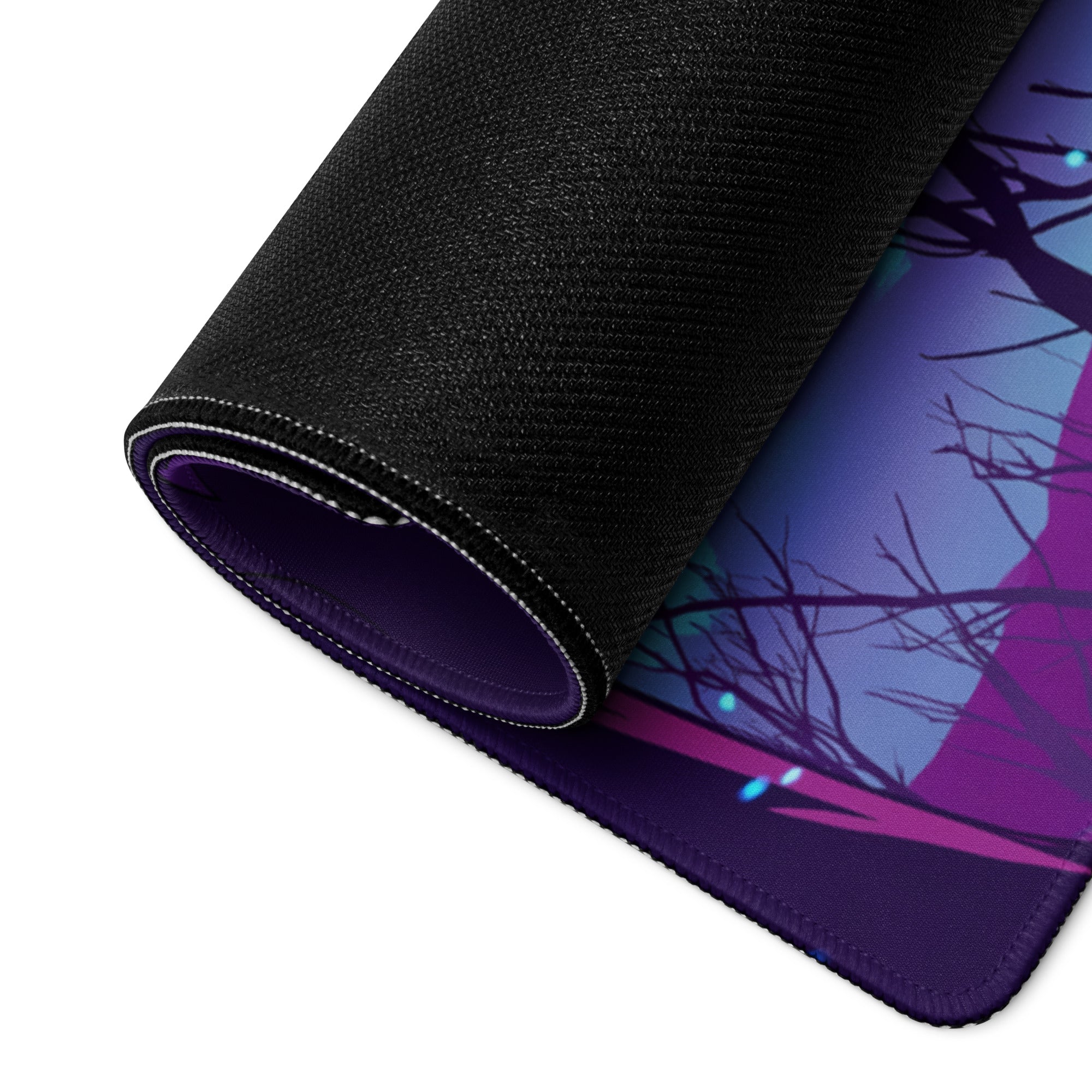 A rolled-up black gaming mousepad with a vibrant purple and blue neon vaporwave fantasy tree design