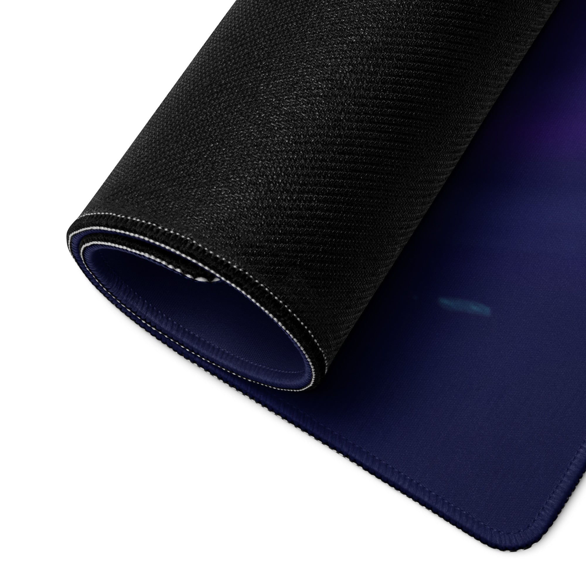 Black textured gaming mousepad with navy blue underside and white stitched edge for vaporwave neon desk setup
