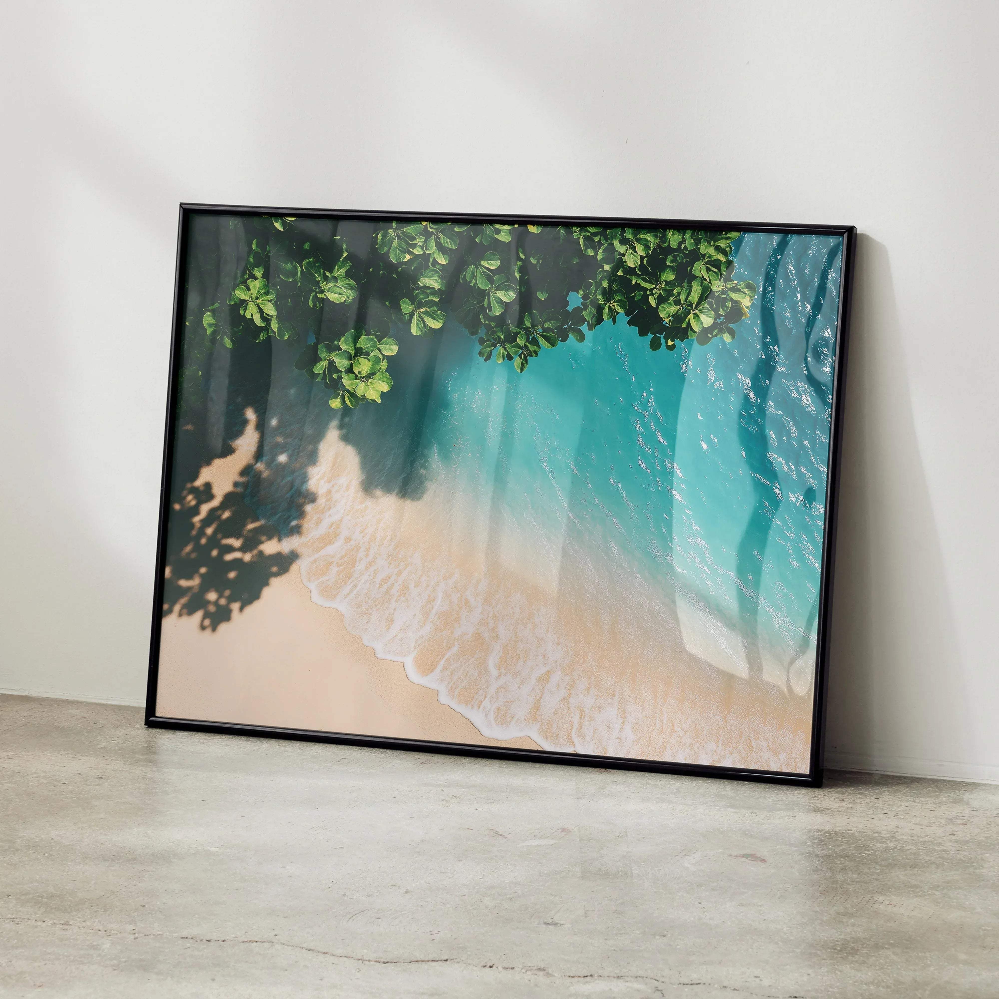 Black-framed stunning beach digital art poster featuring turquoise water sandy shore and green foliage for wall decor