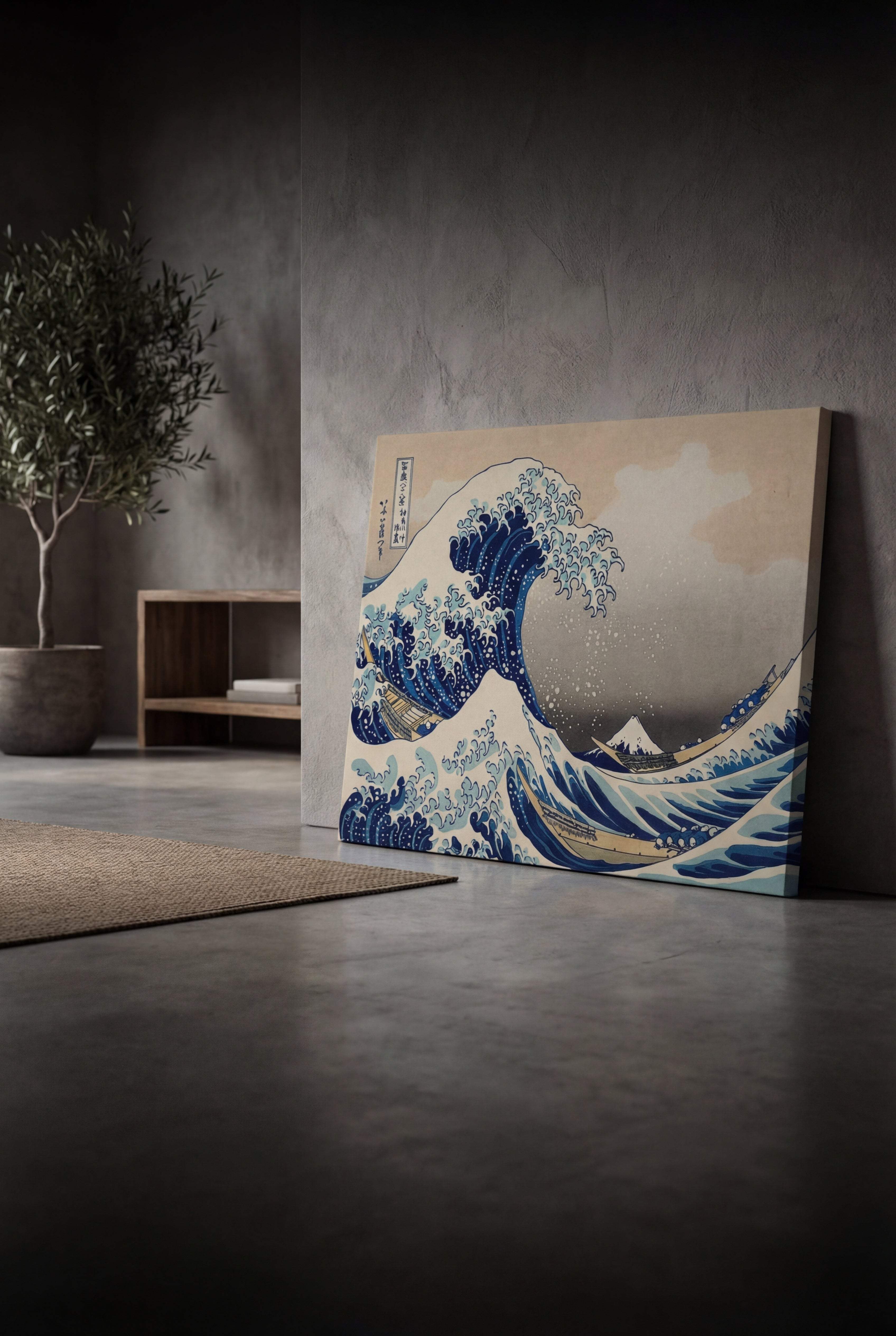 A canvas print of the iconic ’the great wave off kanagawa’ by katsushika hokusai, featuring a towering blue wave with white foam cresting over boats and mount fuji in the distance.