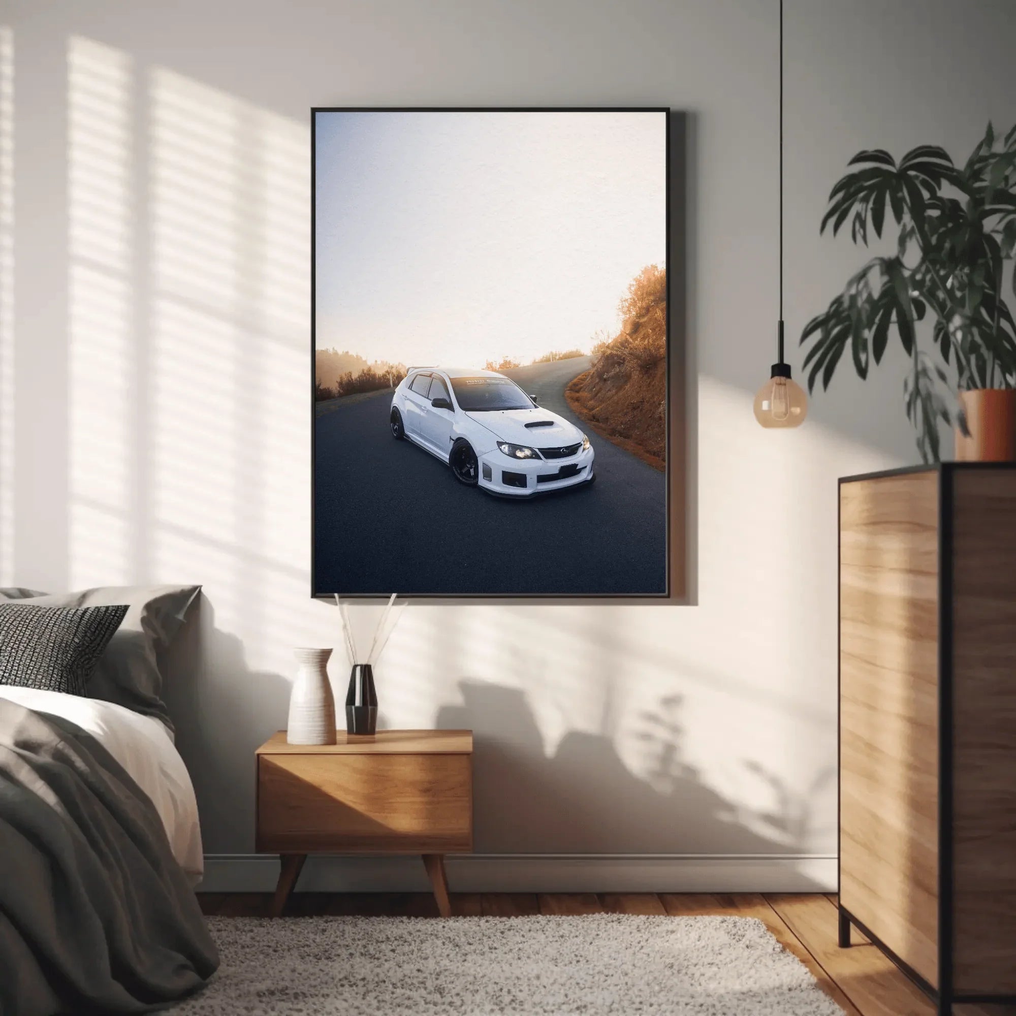 Subaru WRX STI Poster wall art featuring white car on scenic road, framed and hung in modern living room.