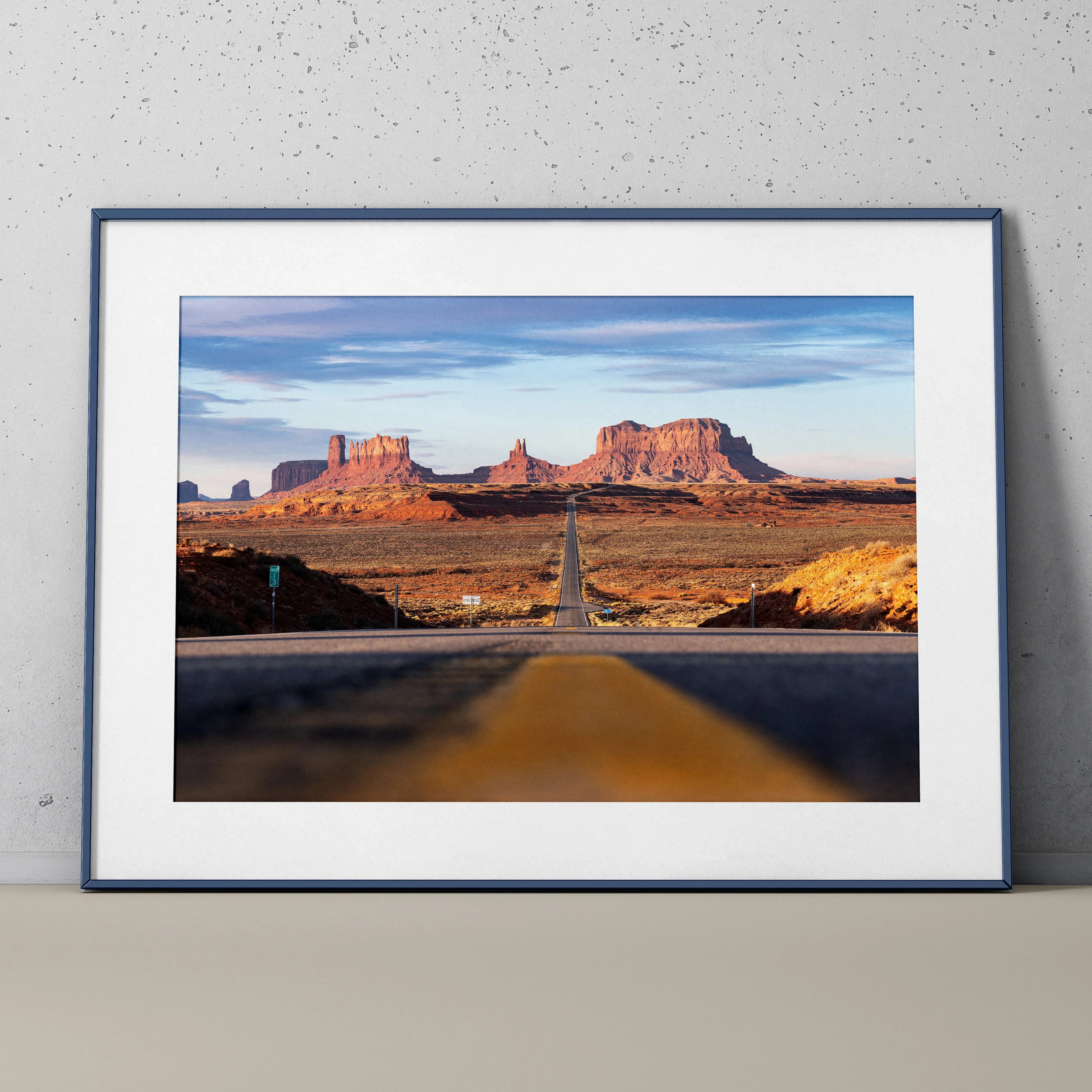 Majestic mountain landscape poster with desert road leading toward red rock formations wall art.
