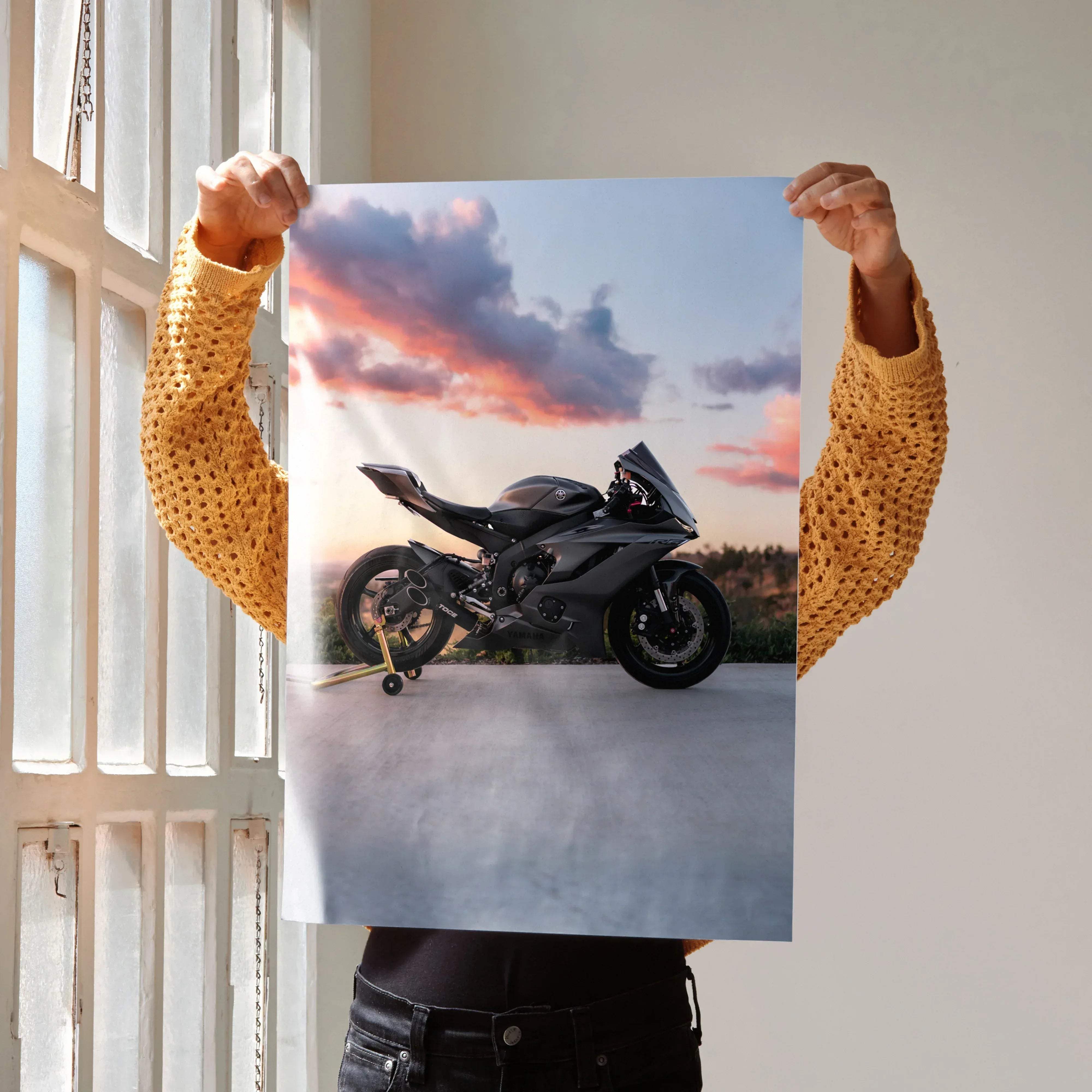 Black Yamaha R6 sport motorcycle poster featuring sleek aerodynamic design with sharp lines and glossy finish at sunset