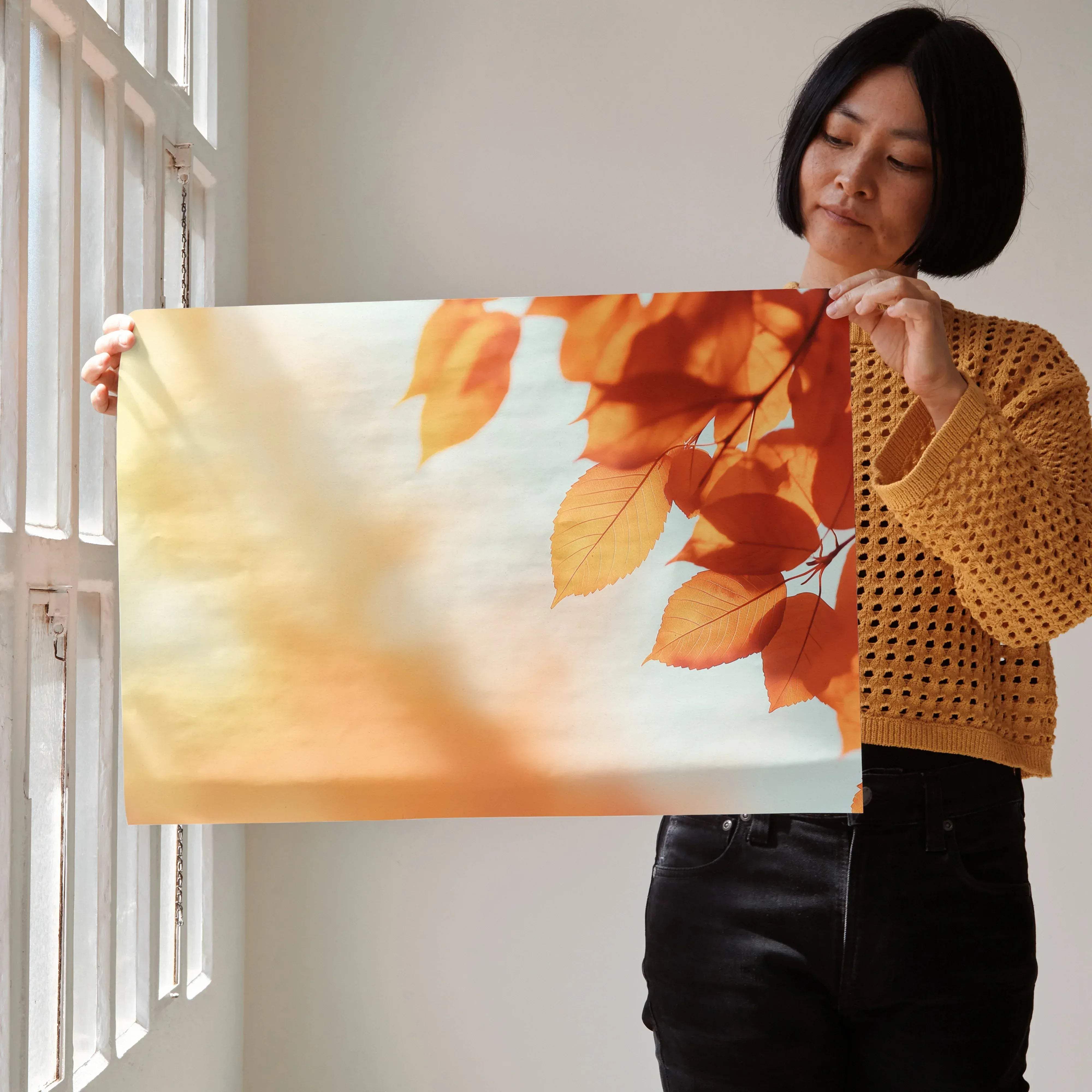 A rectangular digital art poster featuring vibrant orange and yellow autumn leaves on a soft blurred background