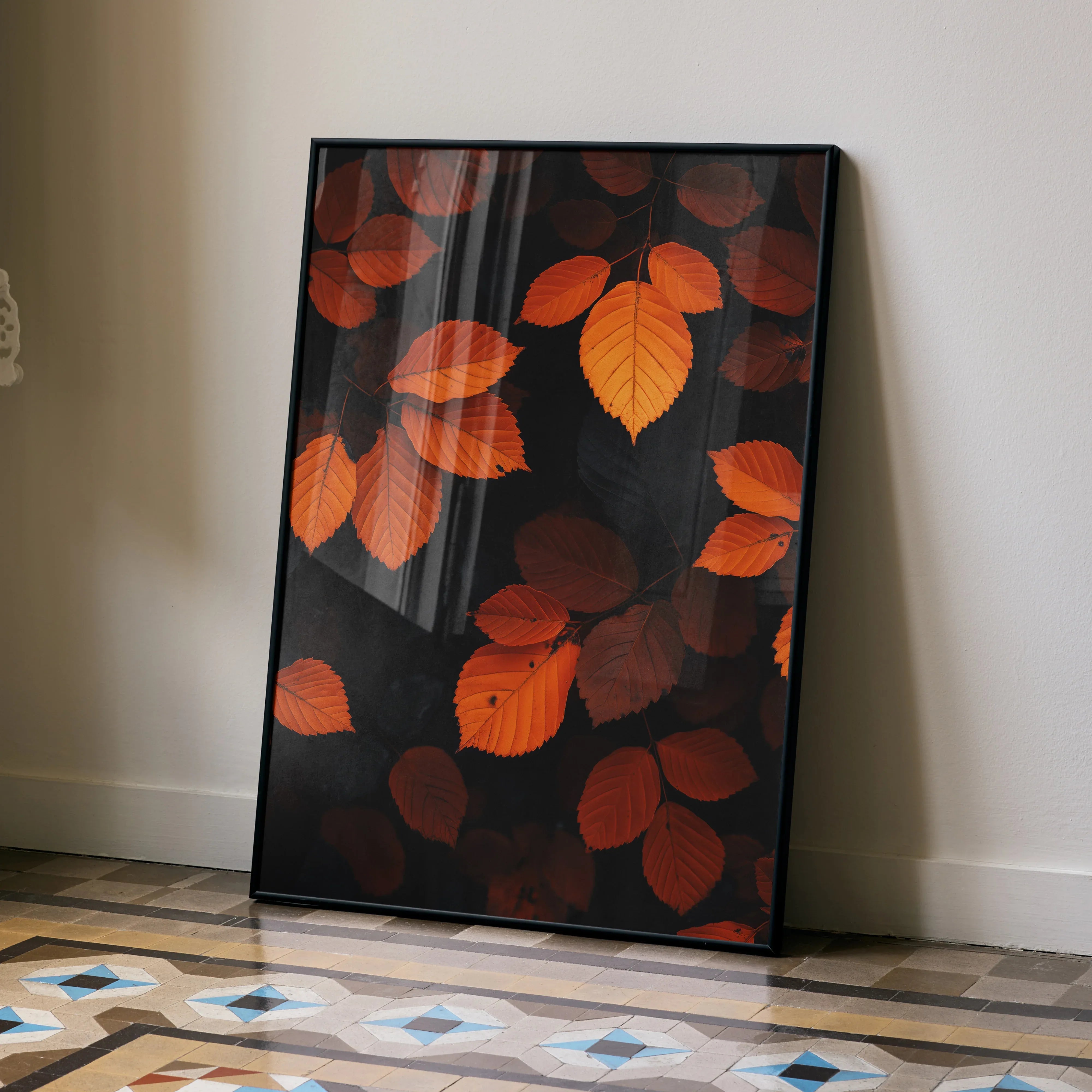 Vertical wall art poster featuring vibrant orange autumn leaves on a dark background.