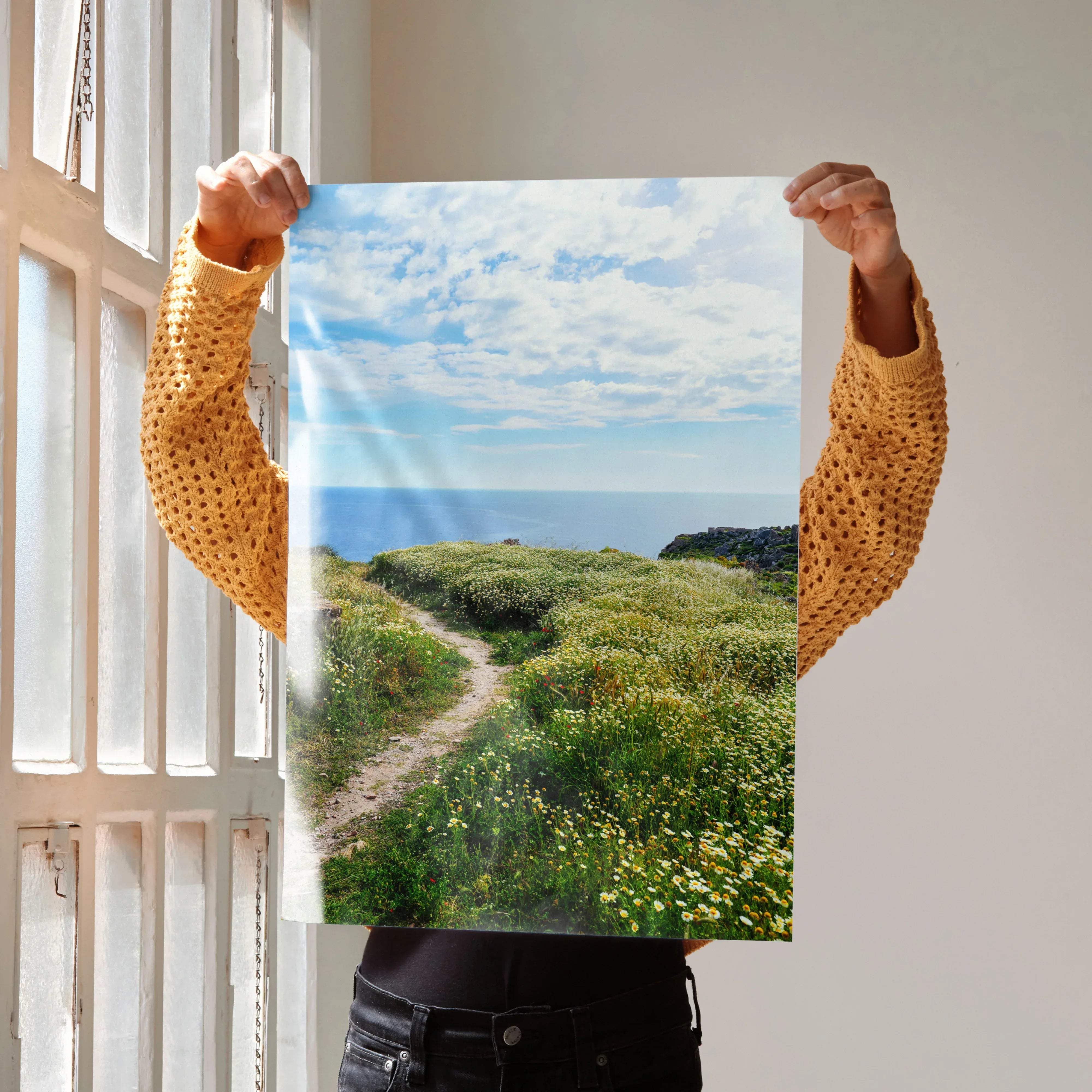 Vibrant floral nature wall art poster featuring a scenic coastal path with green fields and wildflowers under blue sky