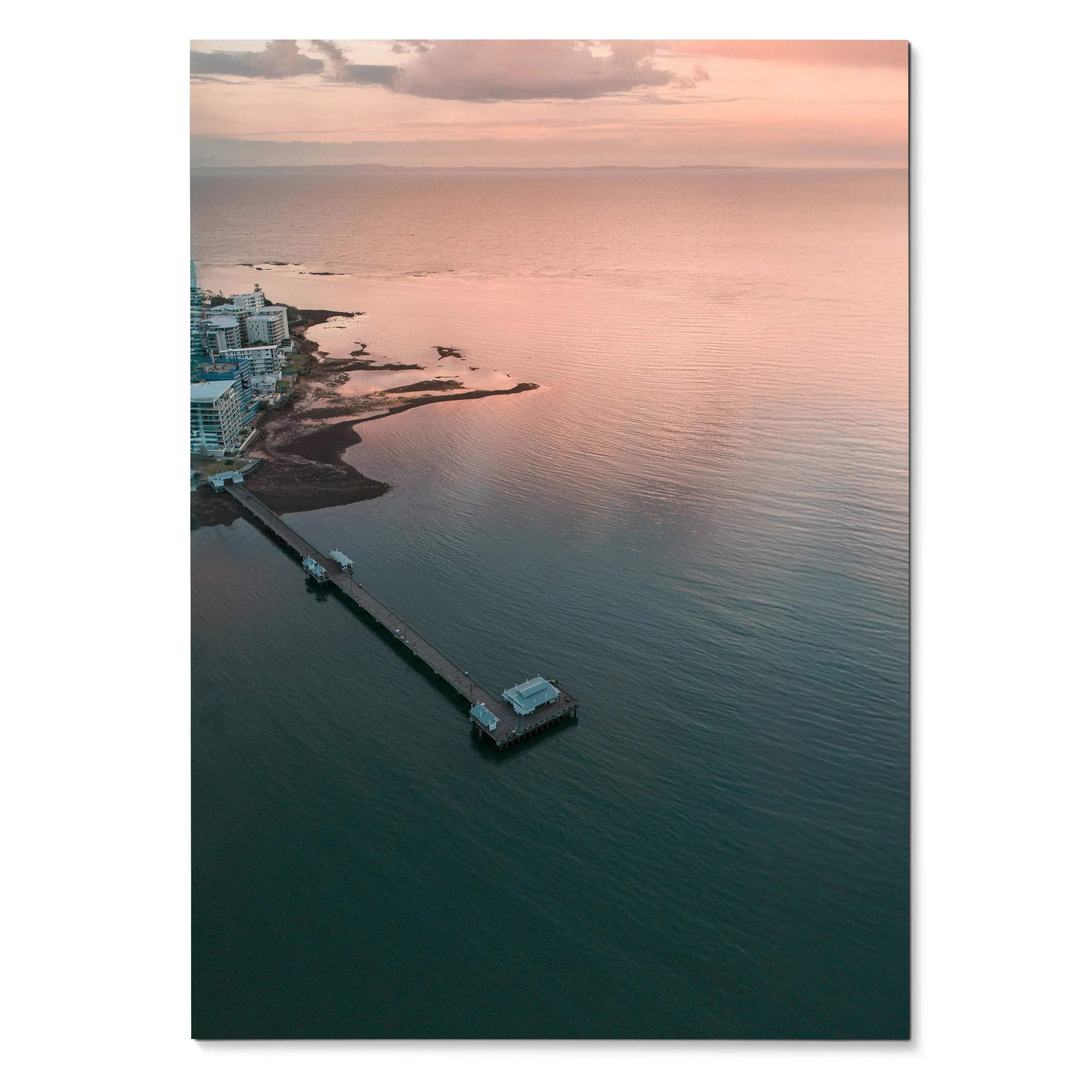 Vertical ocean sunset poster with soft pink and blue hues and a pier extending into calm water wall art.