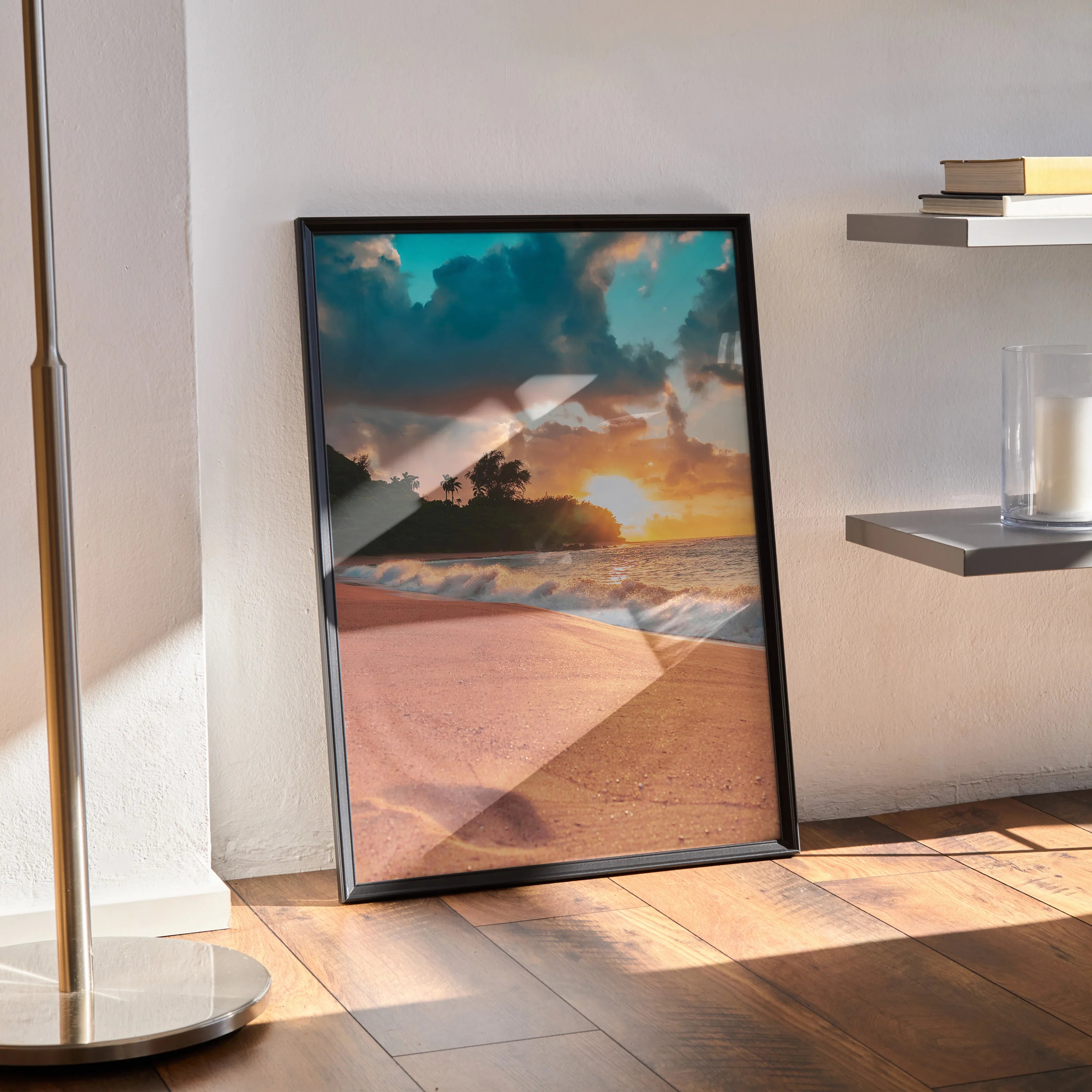 Serene beach sunset poster with ocean waves and clouds, vertical wall art in a black frame.