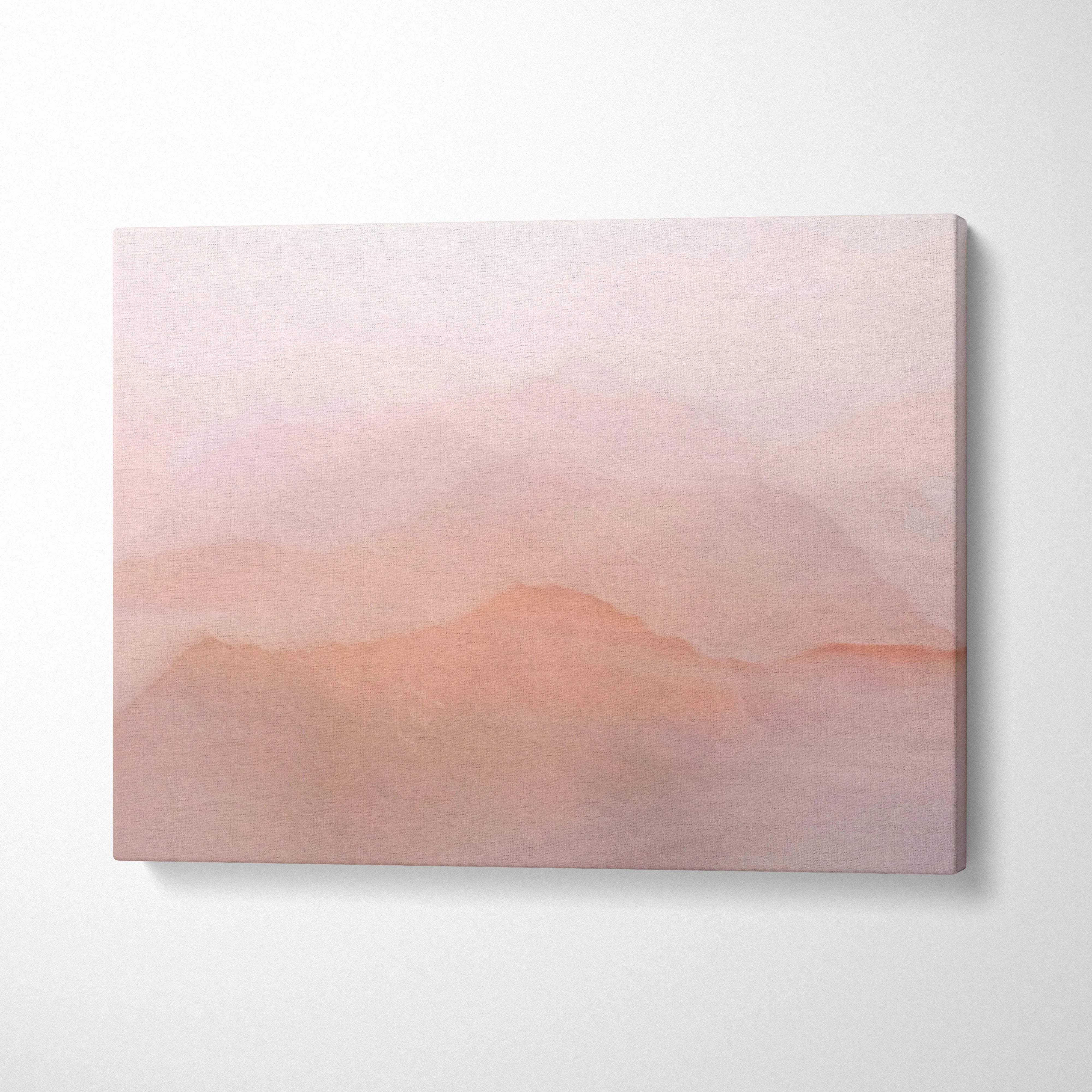 Soft pink gradient canvas print with misty layered mountain silhouettes