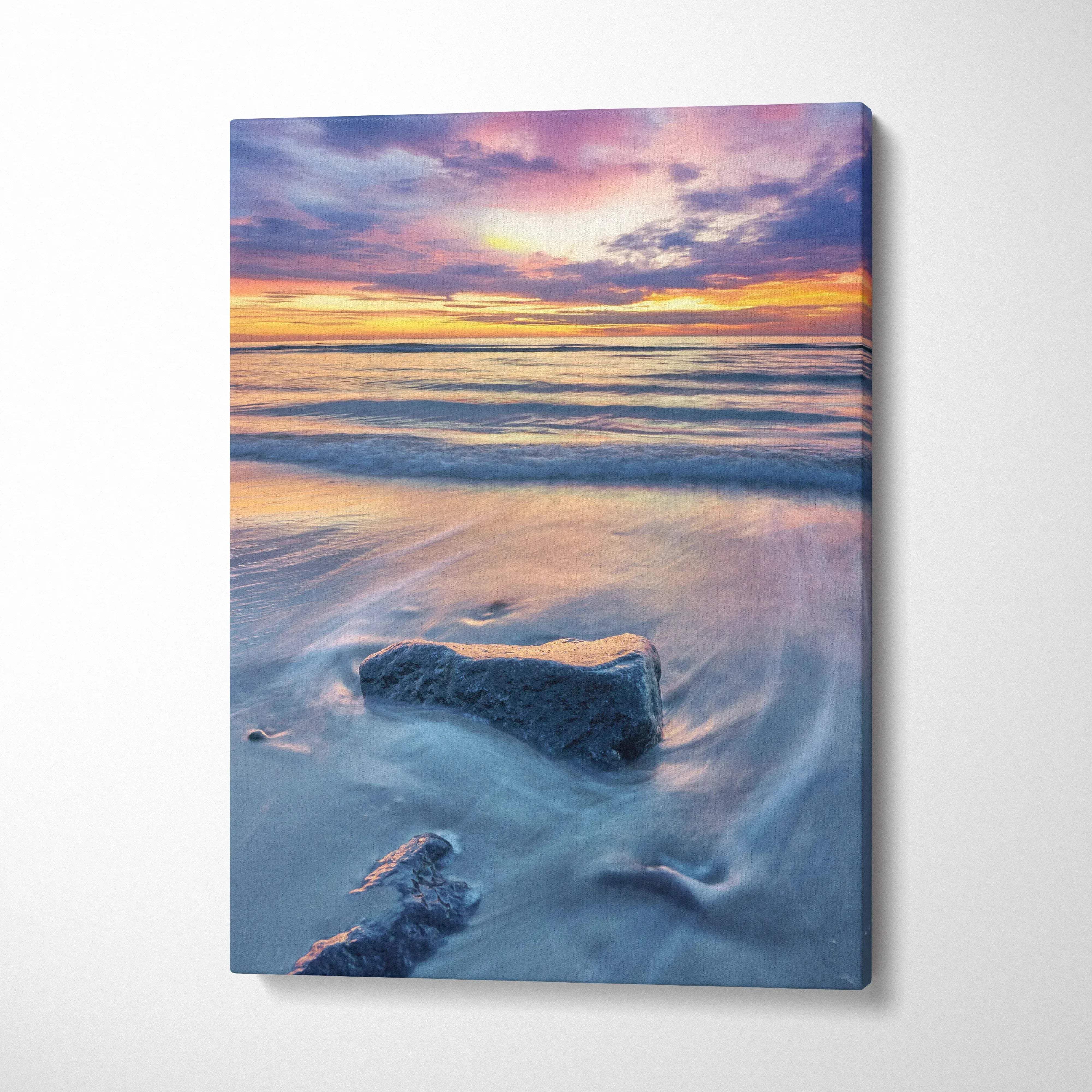 Vertical canvas wall art of tranquil beach sunset with soft waves and colorful sky.