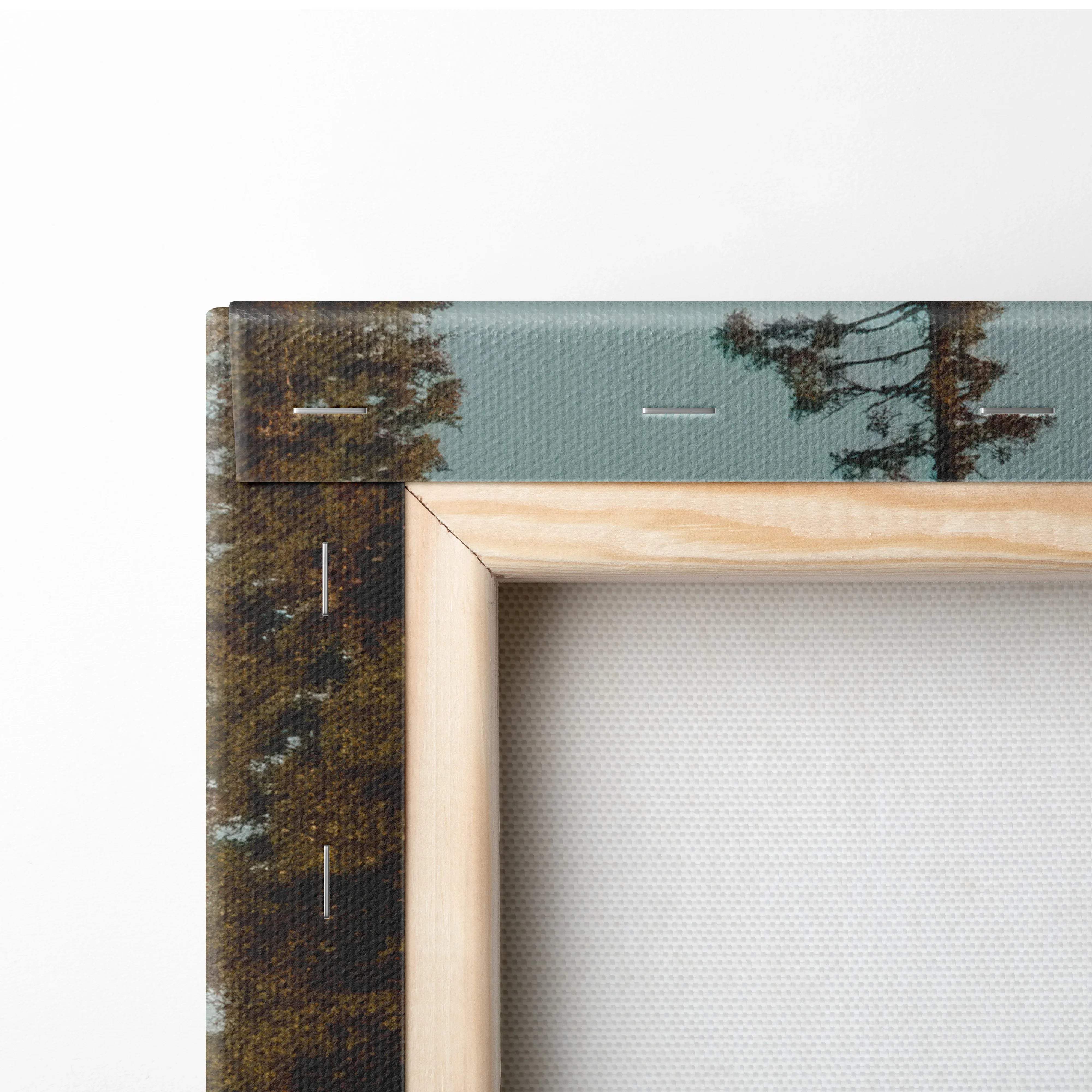 Light wood frame canvas print of serene forest lake mountains in golden hour teal sky