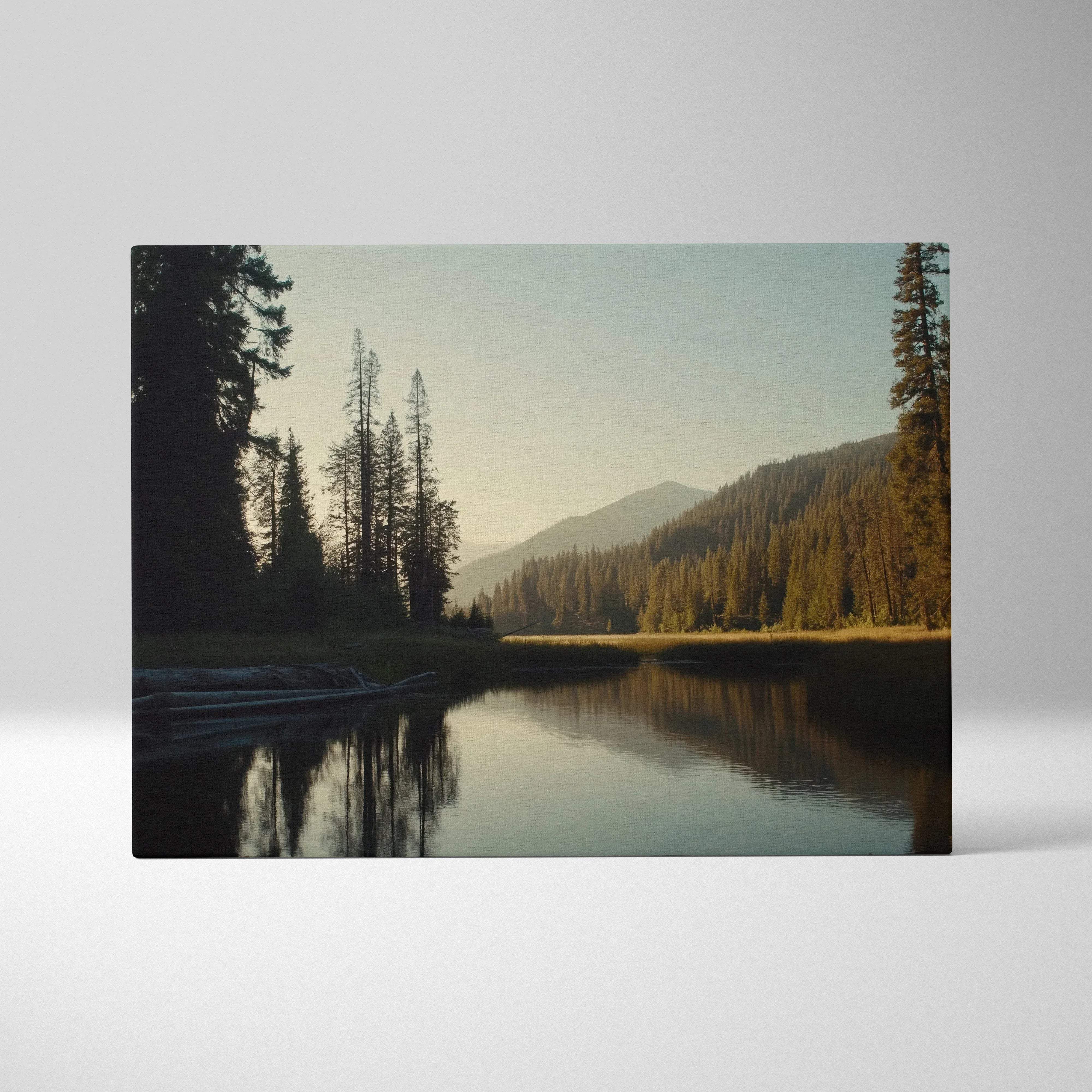Serene canvas wall art of forest lake with mountains and golden hour light