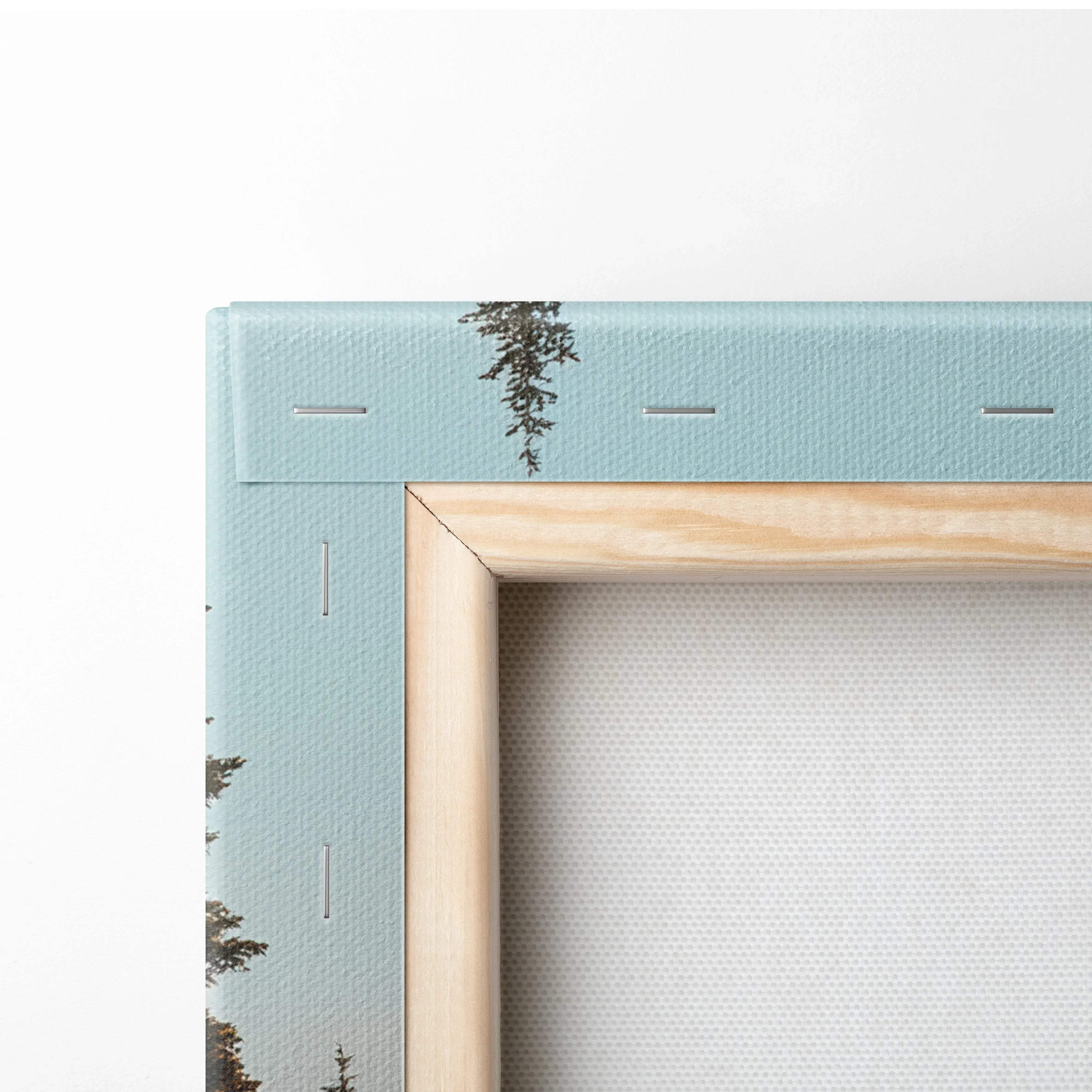 Light blue canvas pine tree art in wood frame, serene blues greens lake scene