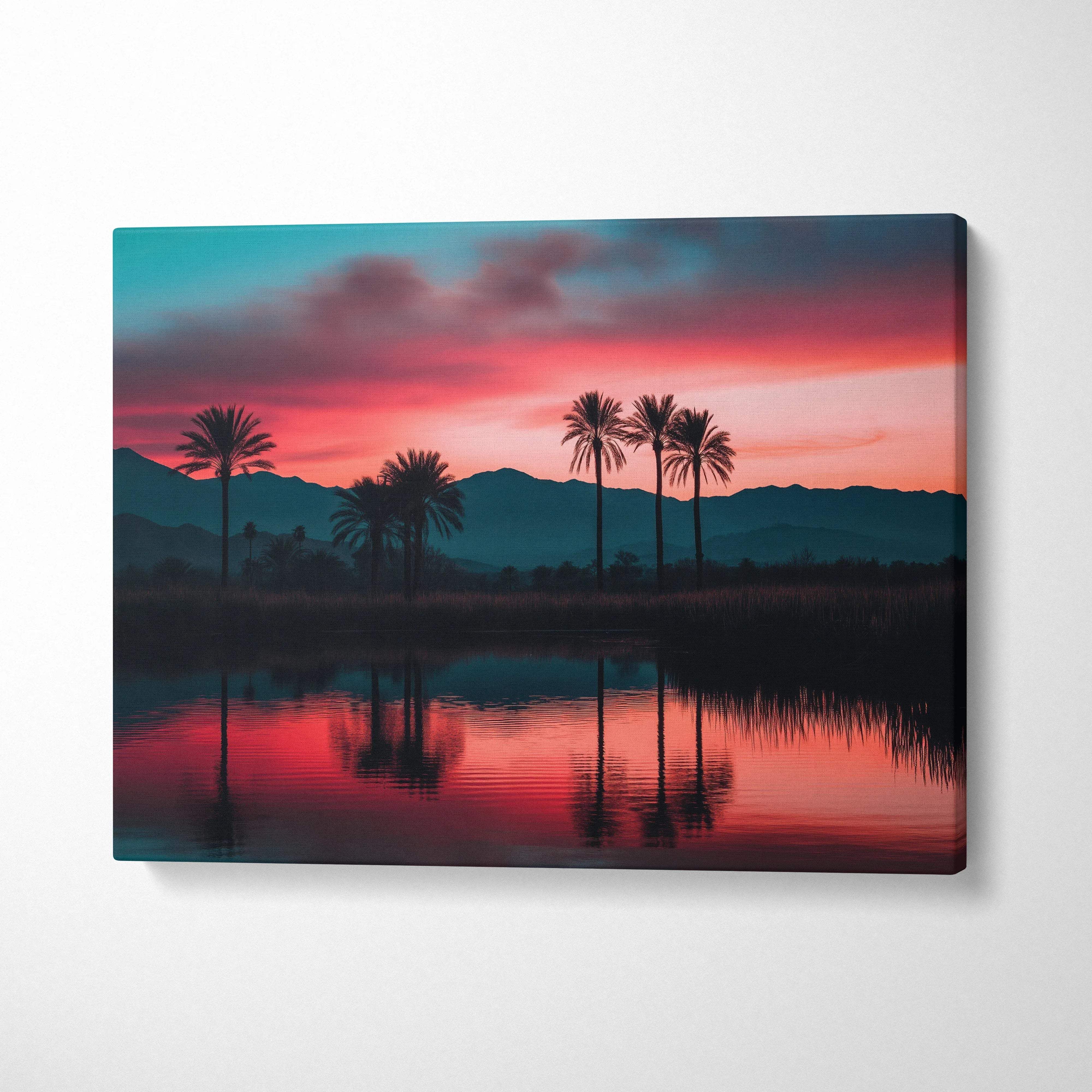 Vibrant canvas wall art of sunset over silhouetted palm trees and mountains in calm water