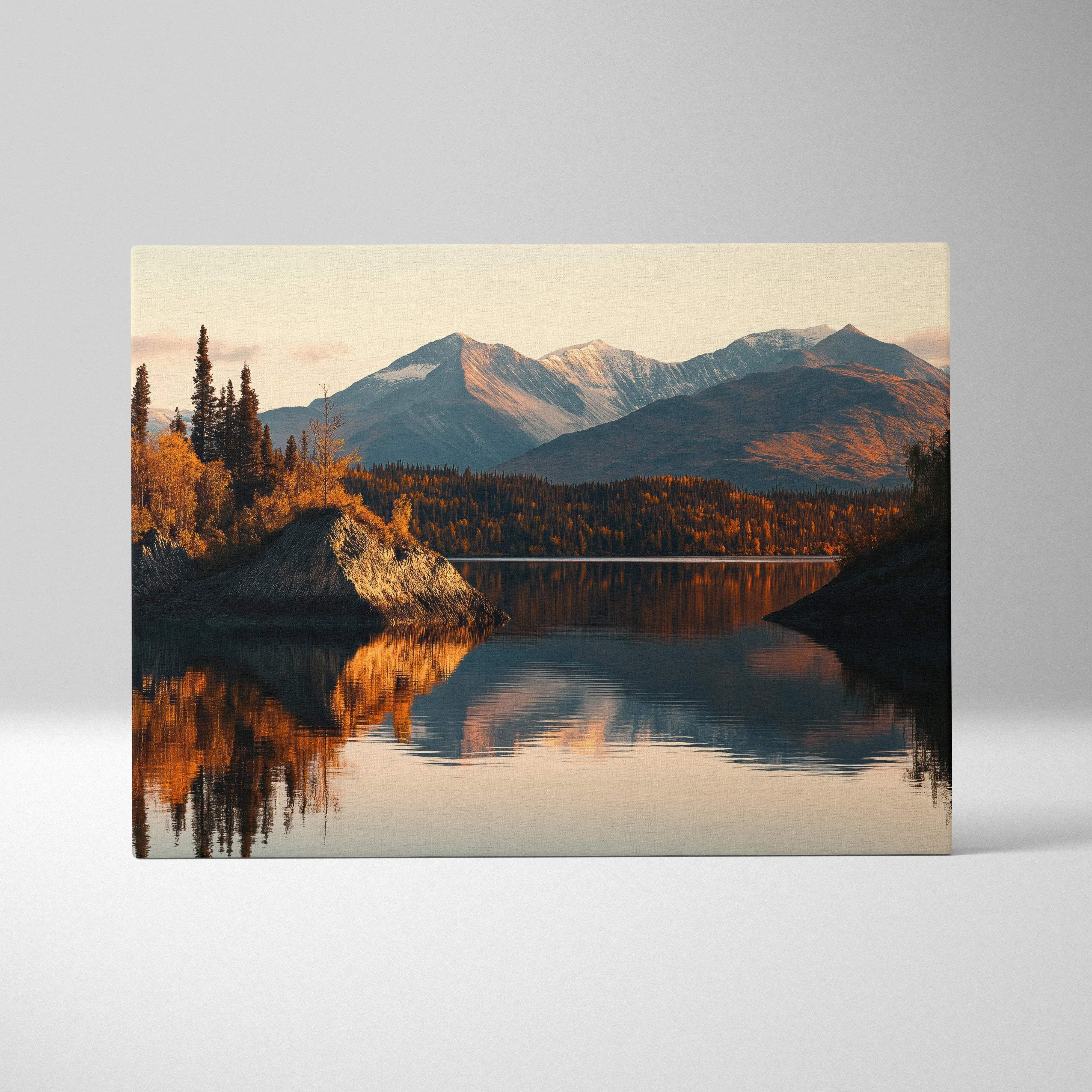 Canvas print of serene autumn mountain lake with snow peaks reflection