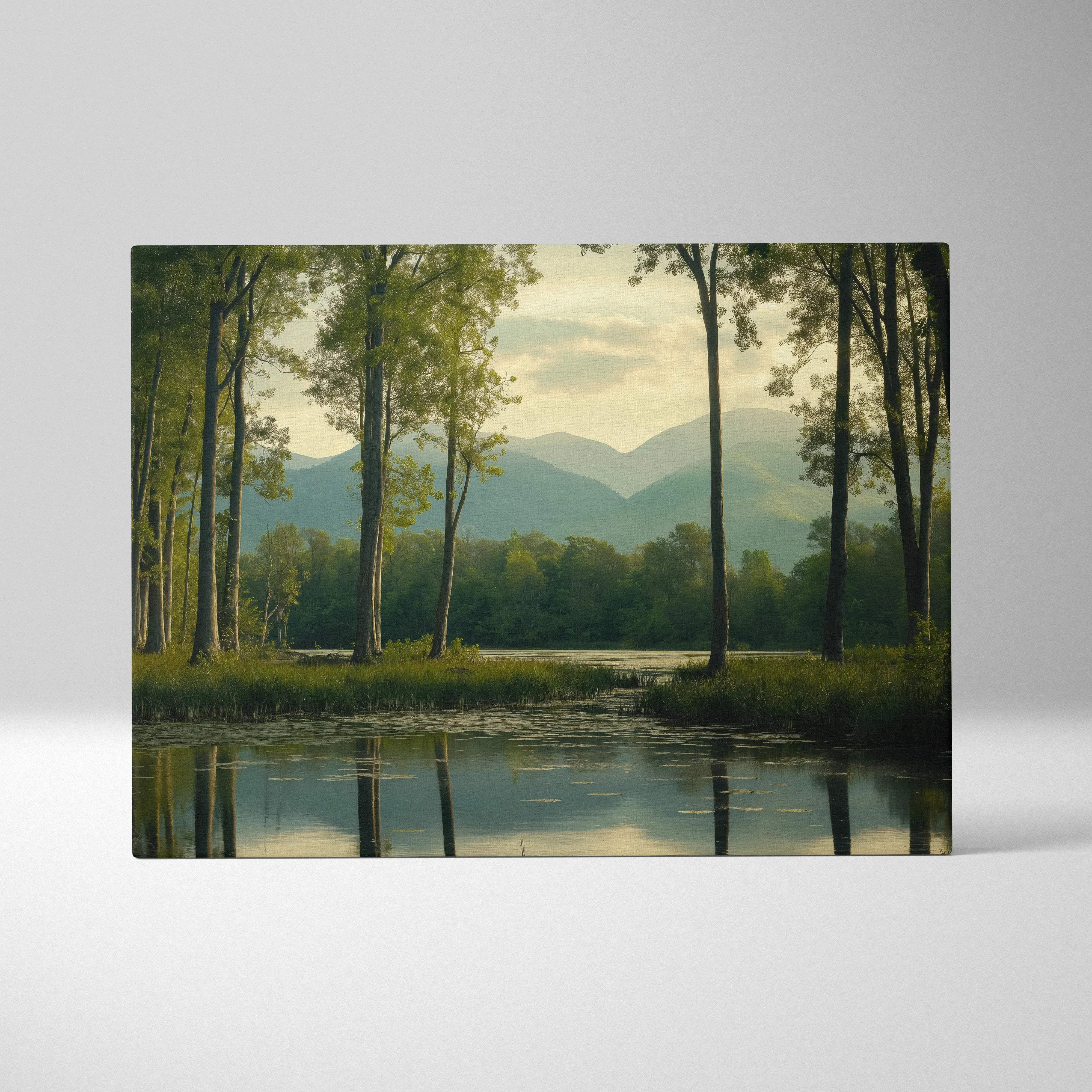 Serene canvas wall art of forest lake with distant mountains in calming greens