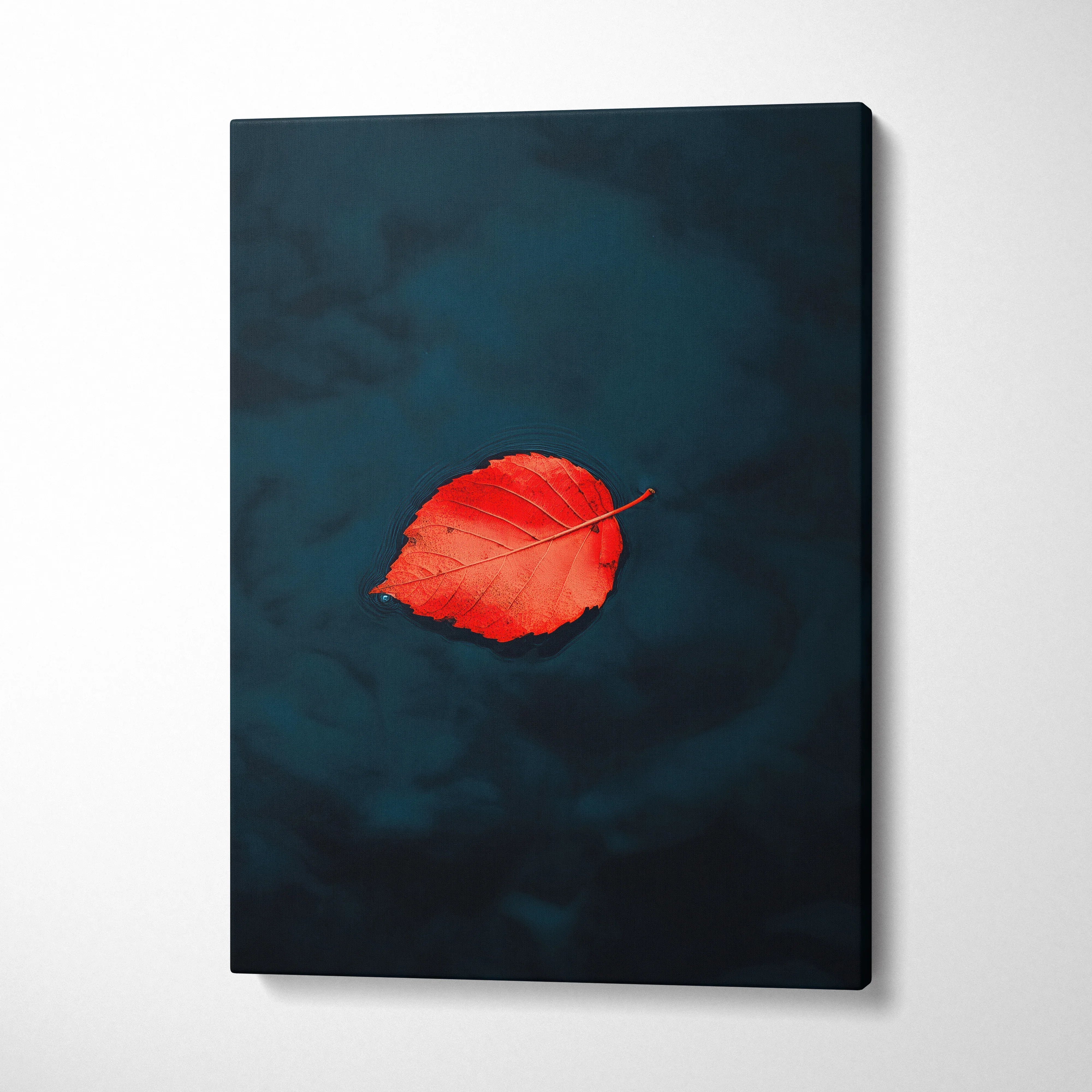 Minimalist autumn red leaf floating on dark water canvas wall art.
