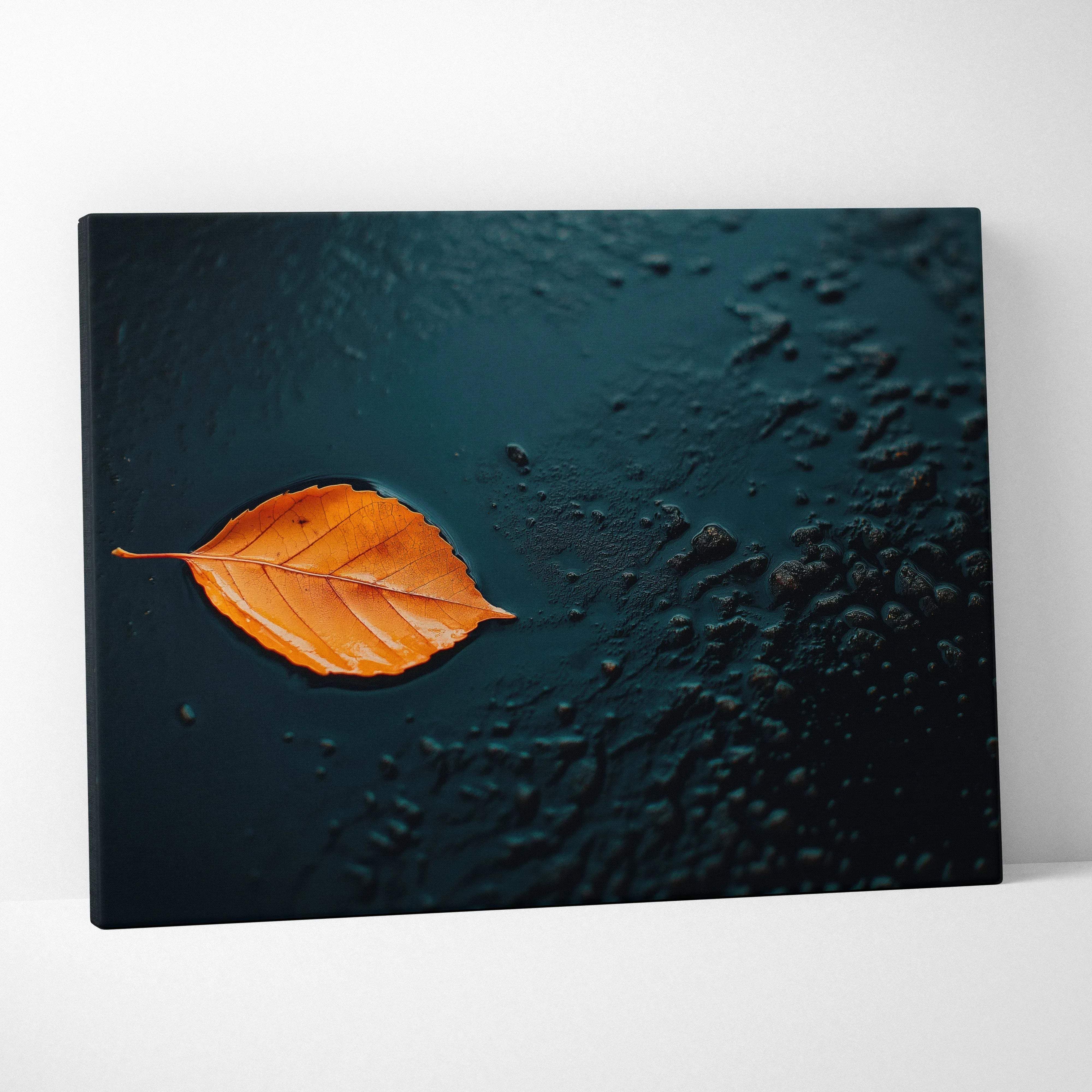 Minimalist autumn leaf canvas wall art featuring a vibrant orange leaf on a dark textured background for modern decor