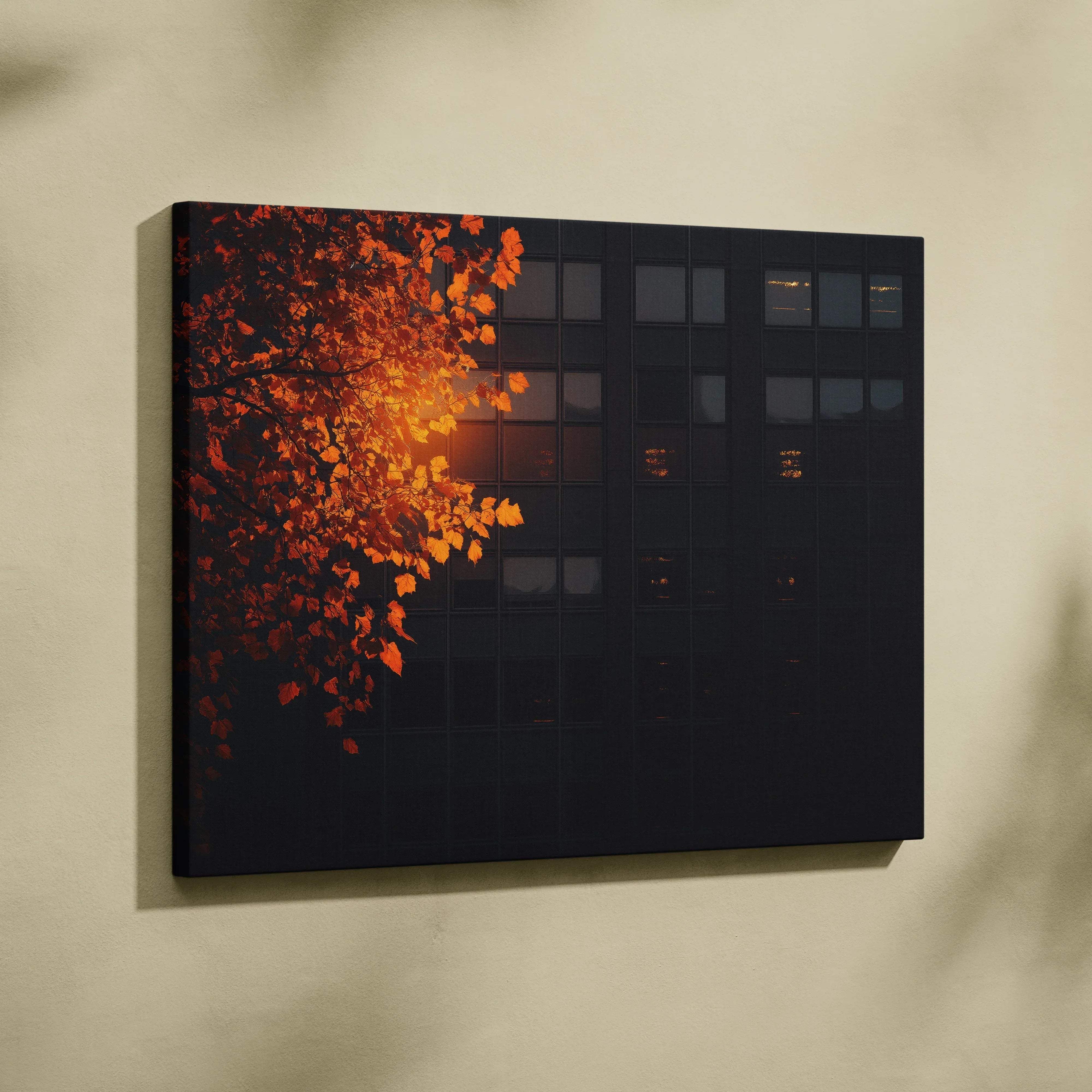 A rectangular canvas print featuring a tree with vibrant orange leaves against a dark modern building silhouette
