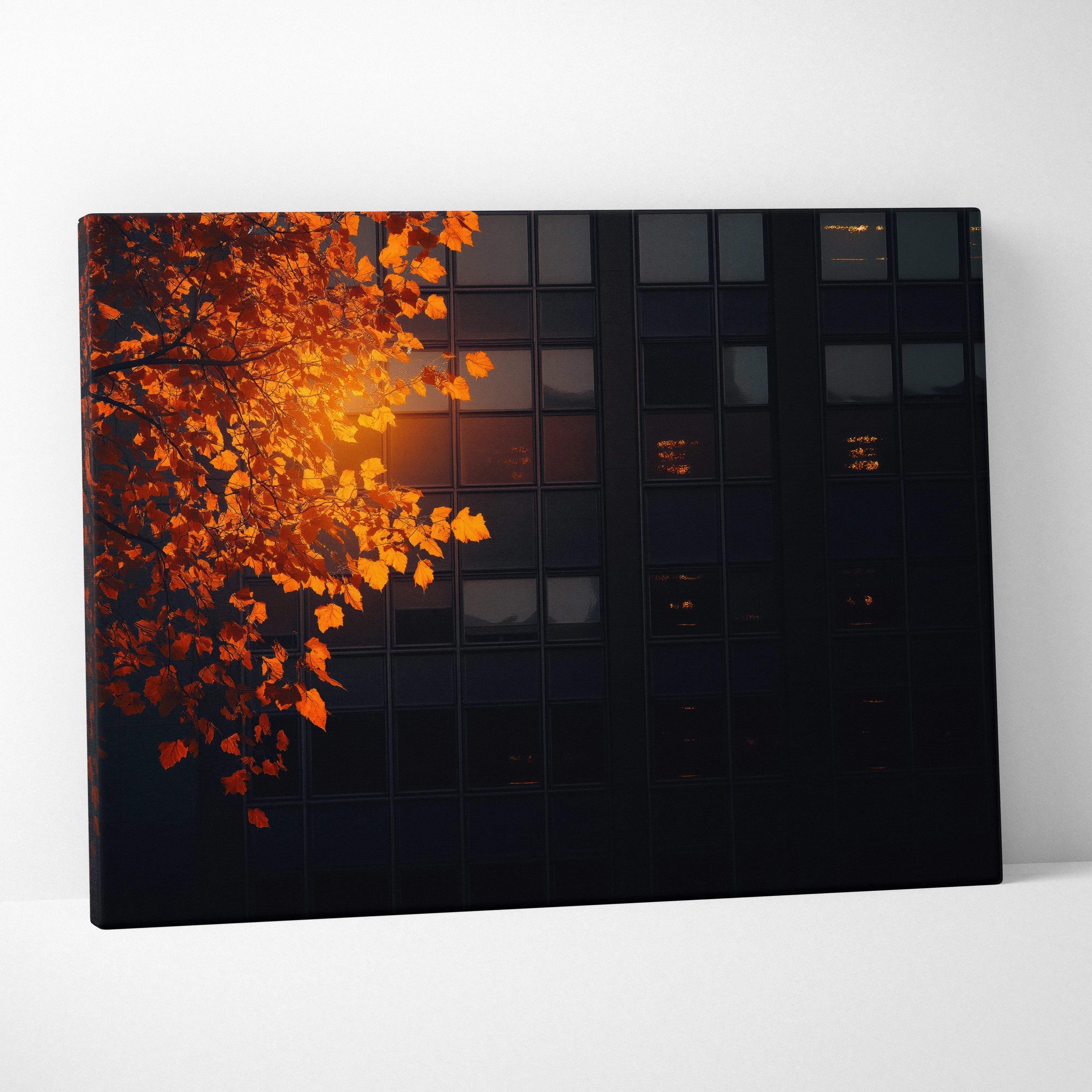 Canvas print featuring a vibrant orange autumn tree branch against a dark modern building facade in warm golden tones