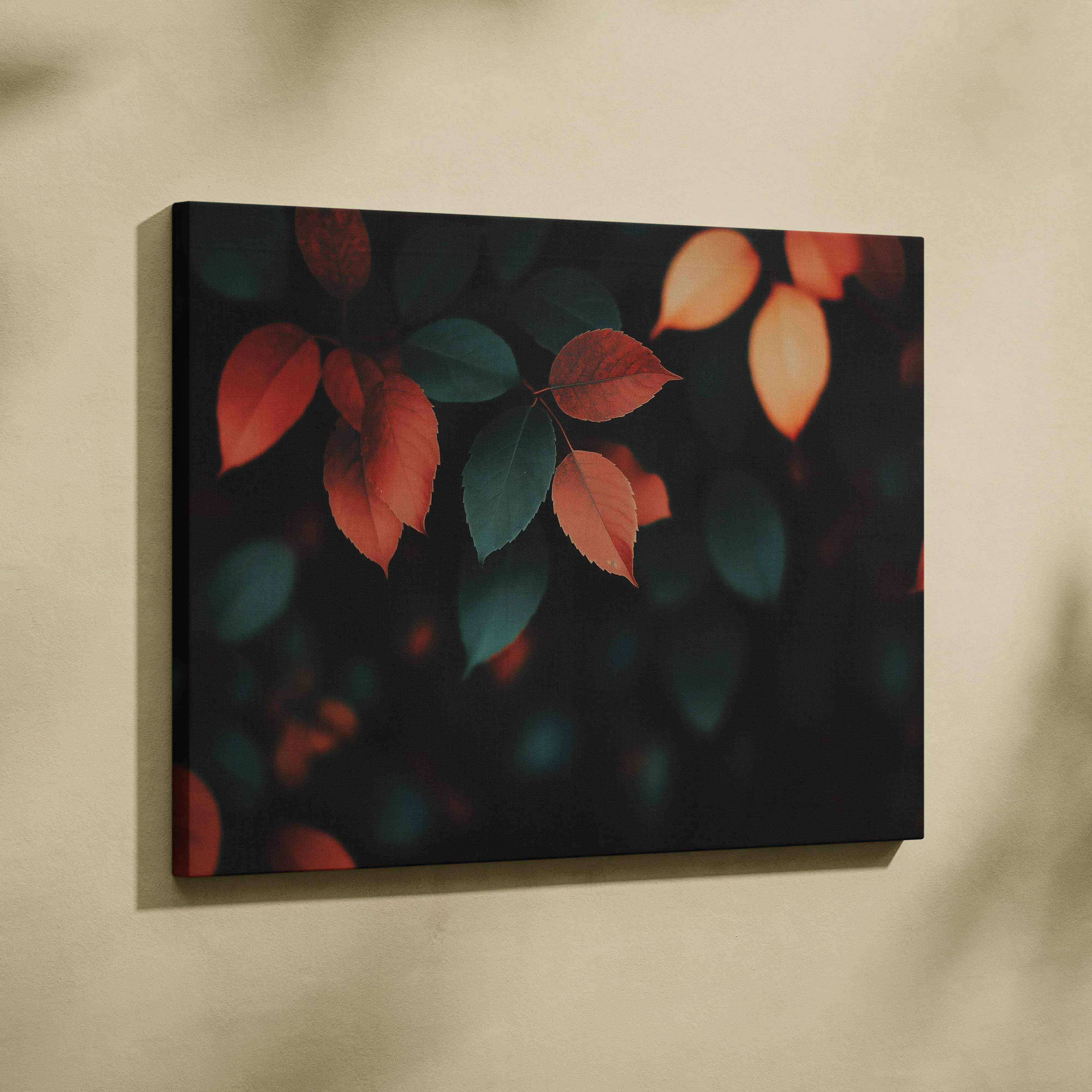 Rectangular canvas wall art featuring close-up autumn leaves in warm orange and deep green hues on dark background