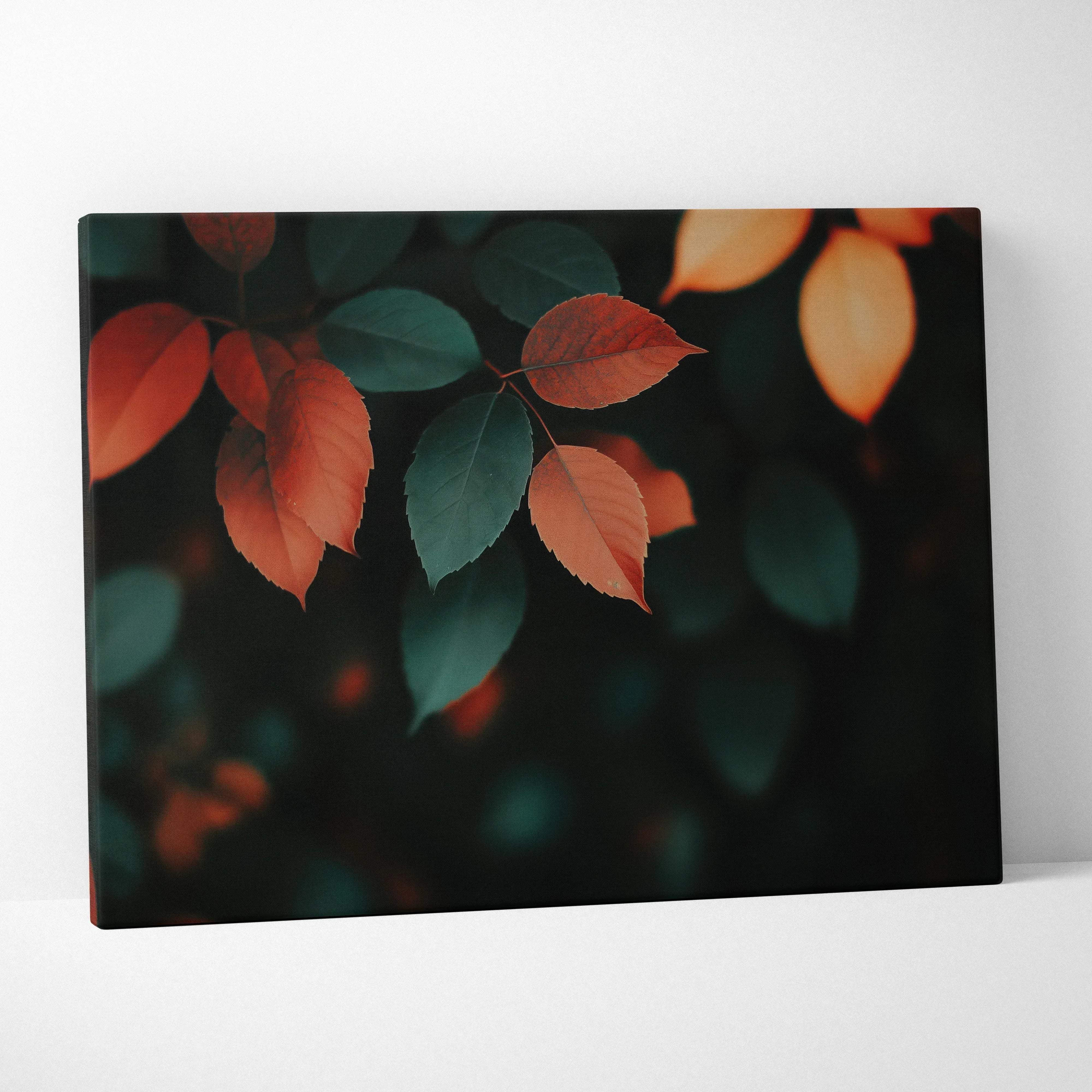 Minimalist autumn leaves canvas wall art featuring close-up orange and green leaves with warm golden hues on dark background