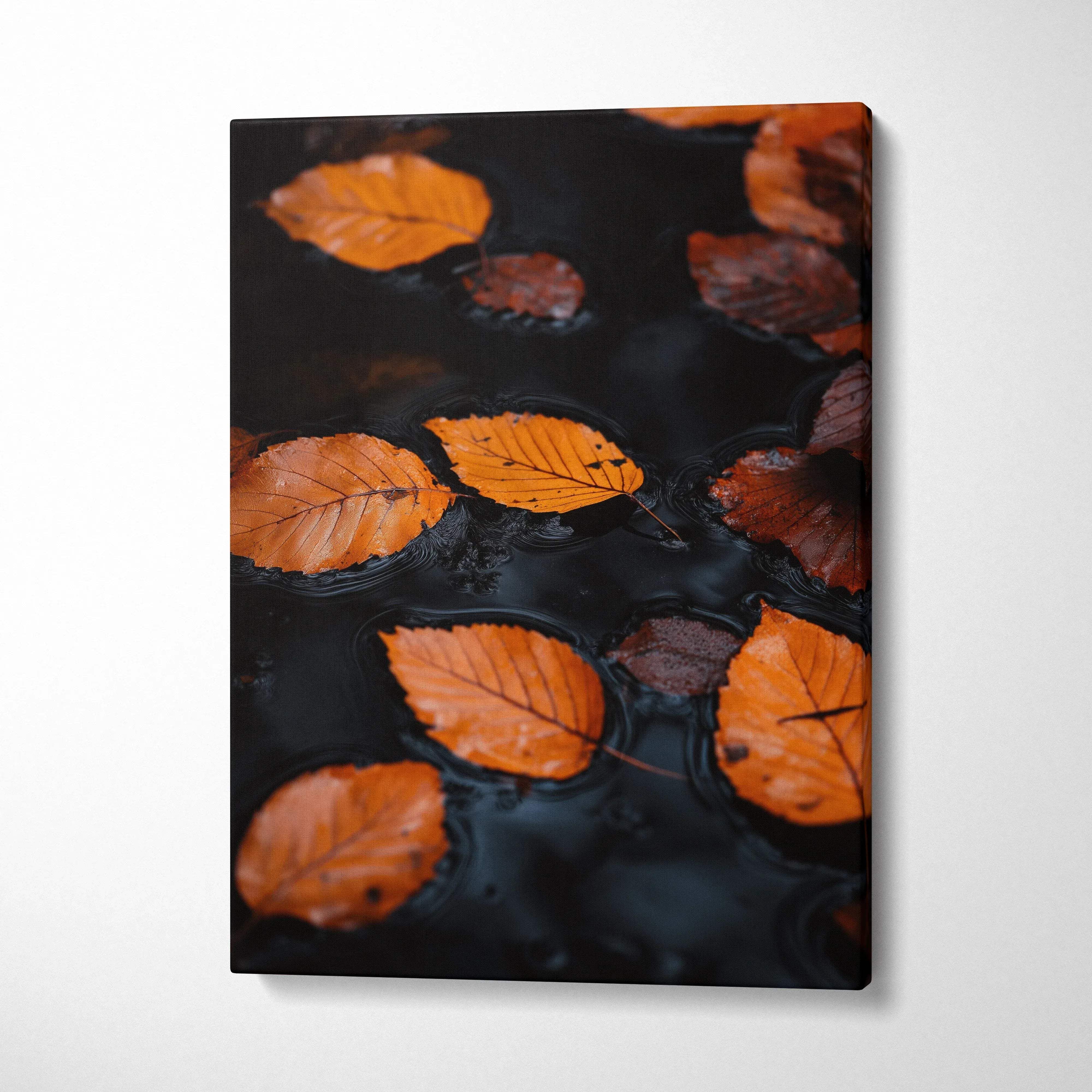 Minimalist autumn leaves floating on dark water canvas wall art print.