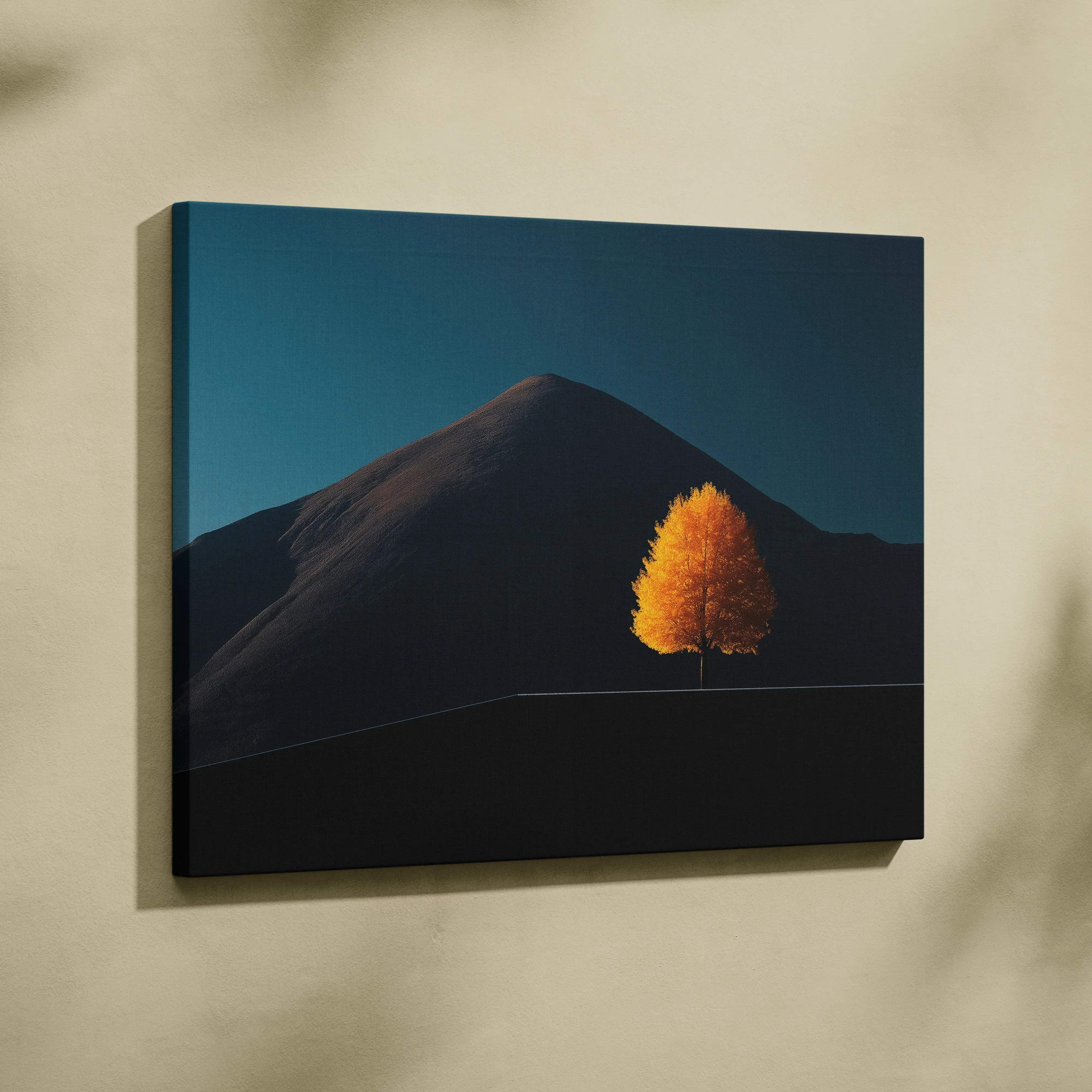 A framed minimalist landscape canvas print of a vibrant orange autumn tree against dark mountains and a teal sky