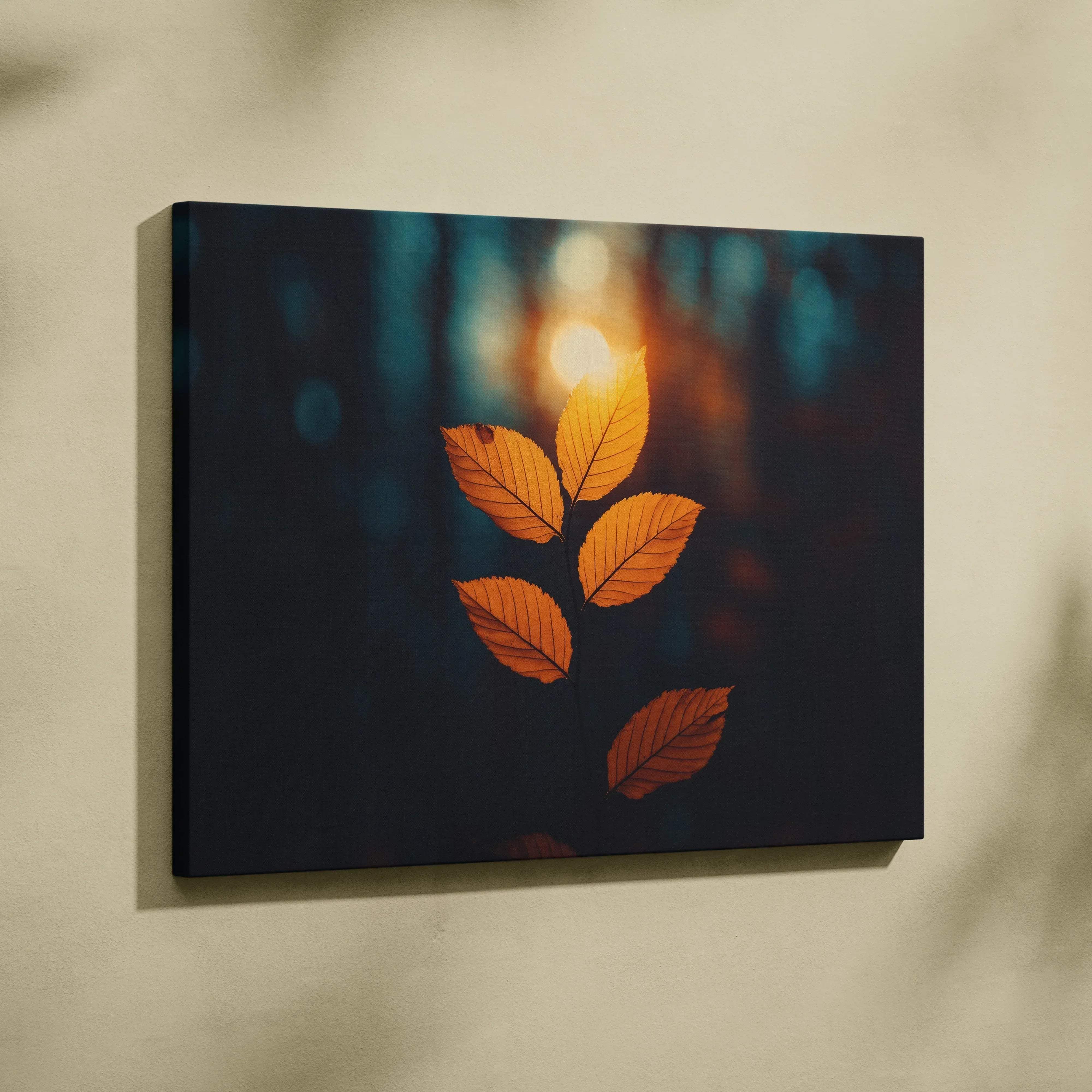 A square canvas wall art print featuring five golden-orange autumn leaves with soft bokeh lighting on a dark background