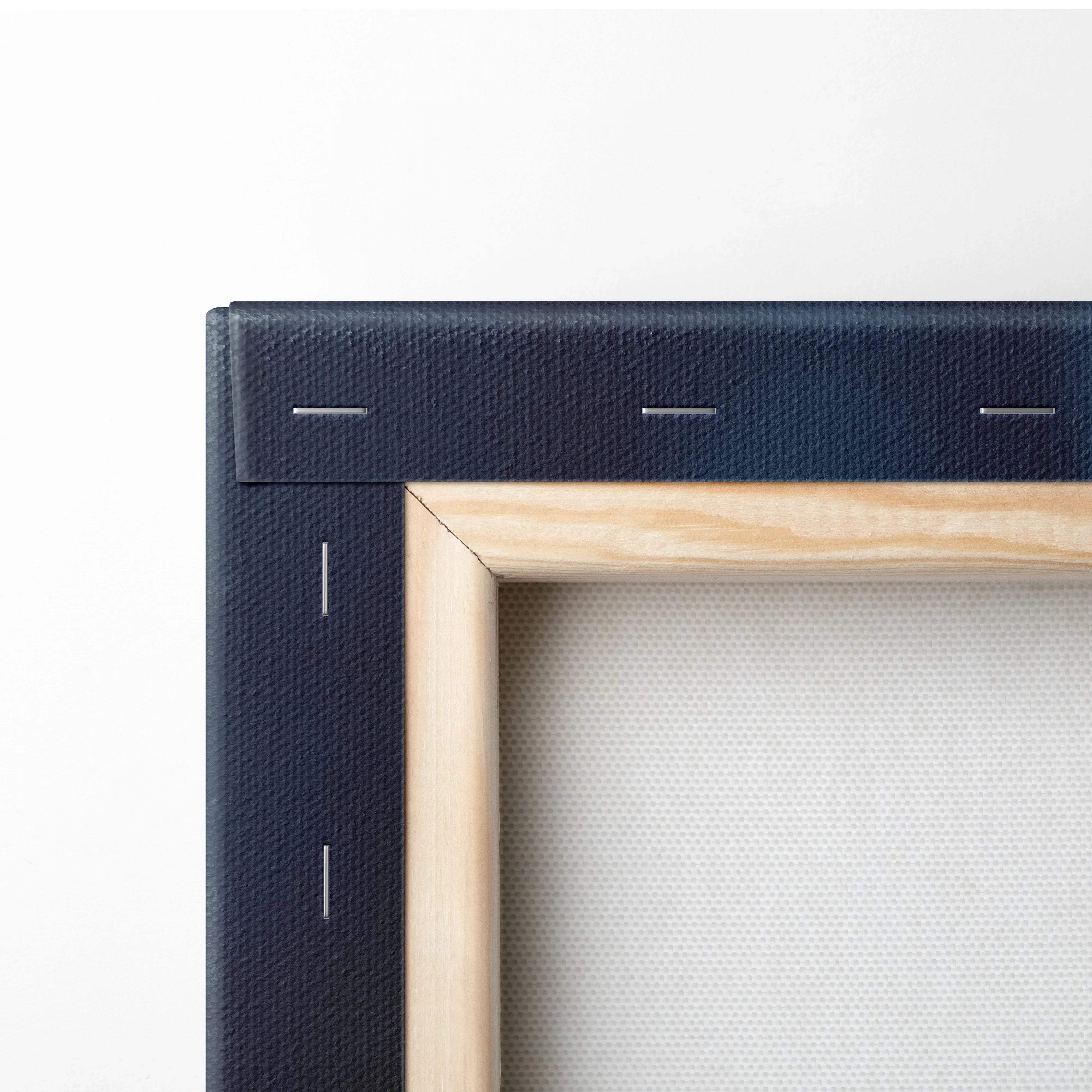 Navy blue textured canvas frame with light wood border featuring minimalist autumn leaves on moody blue backdrop for living room decor