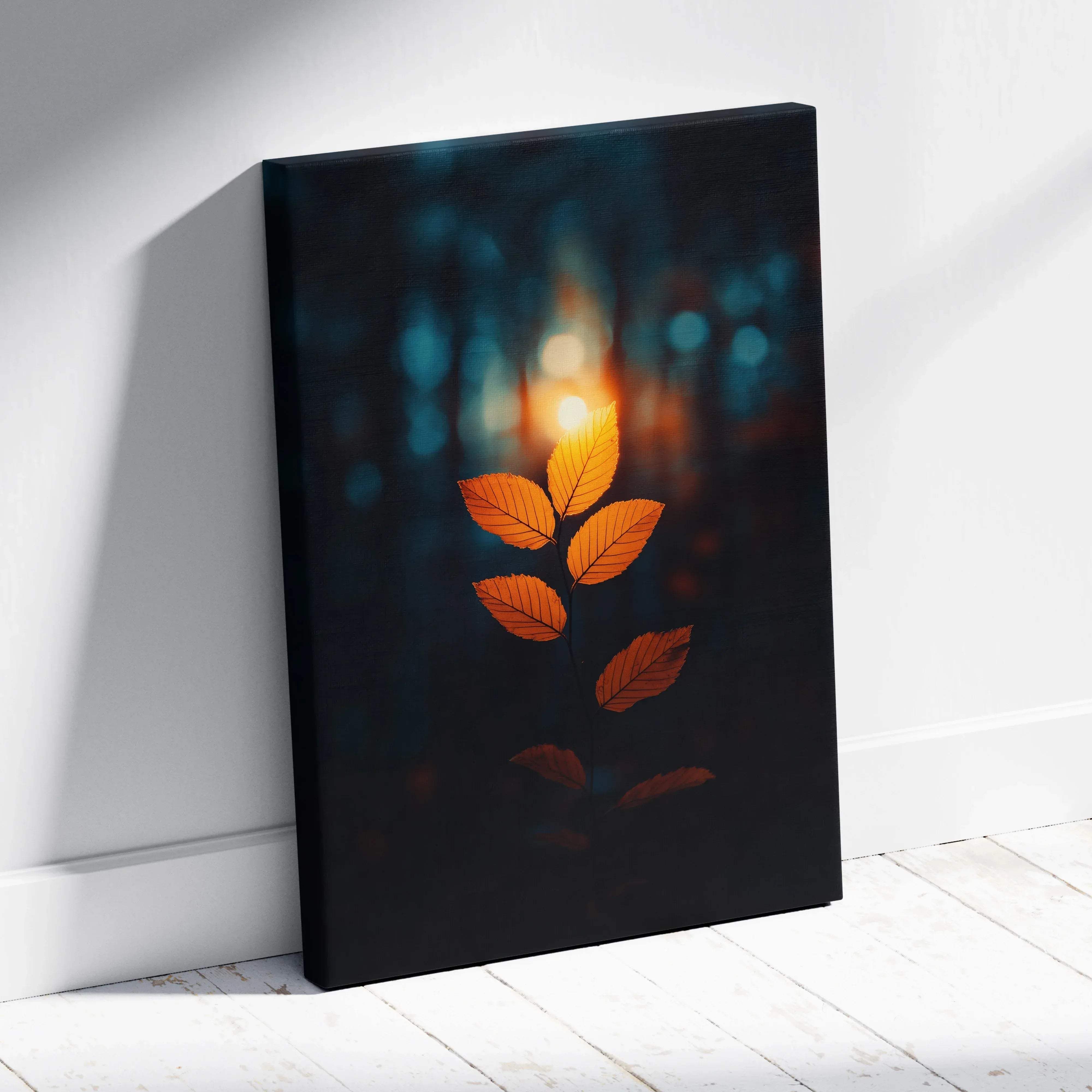 A framed canvas print of minimalist autumn leaves with warm amber glow against a dark forest backdrop