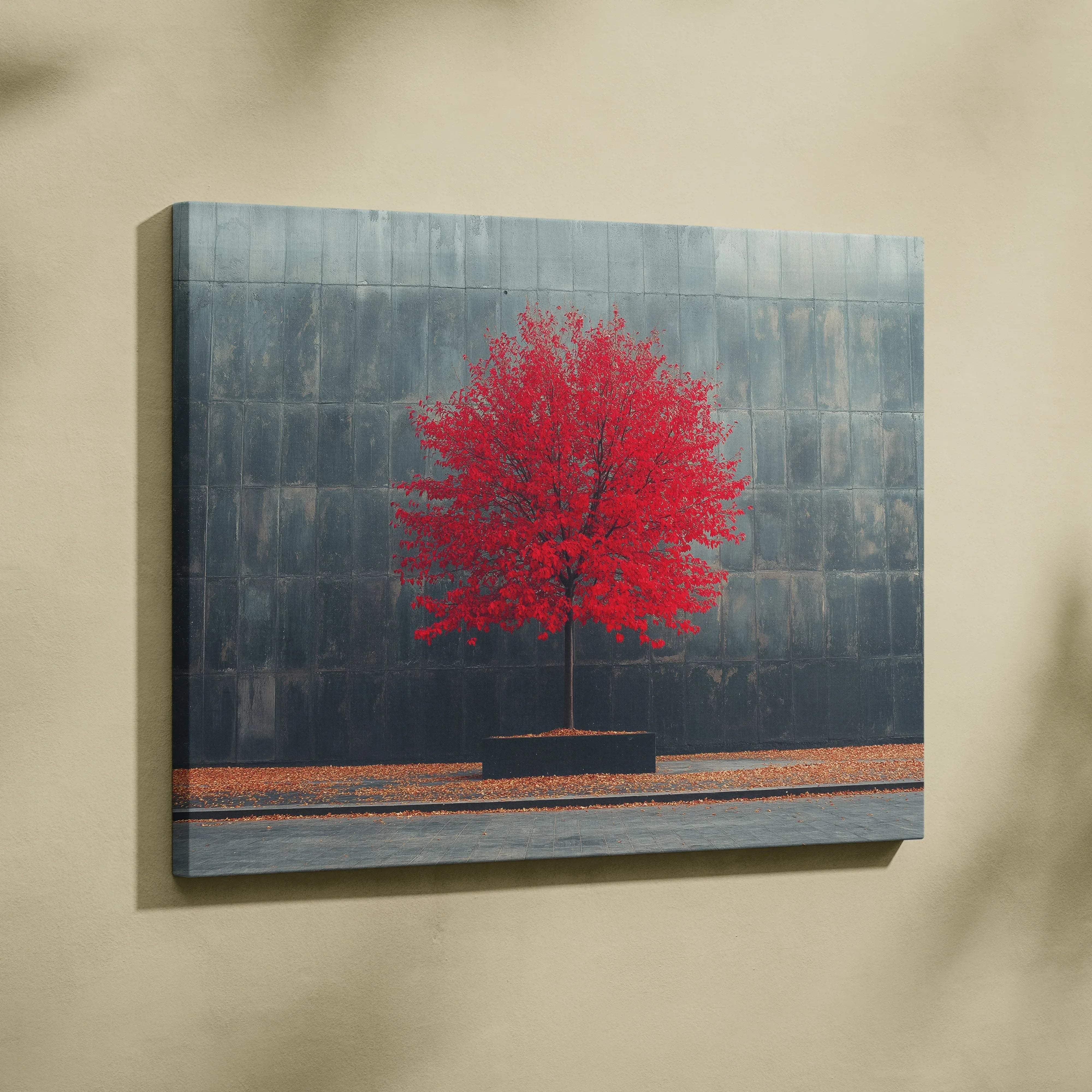 Vibrant red autumn tree printed on stretched canvas against dark gray tiled wall backdrop minimalist landscape art