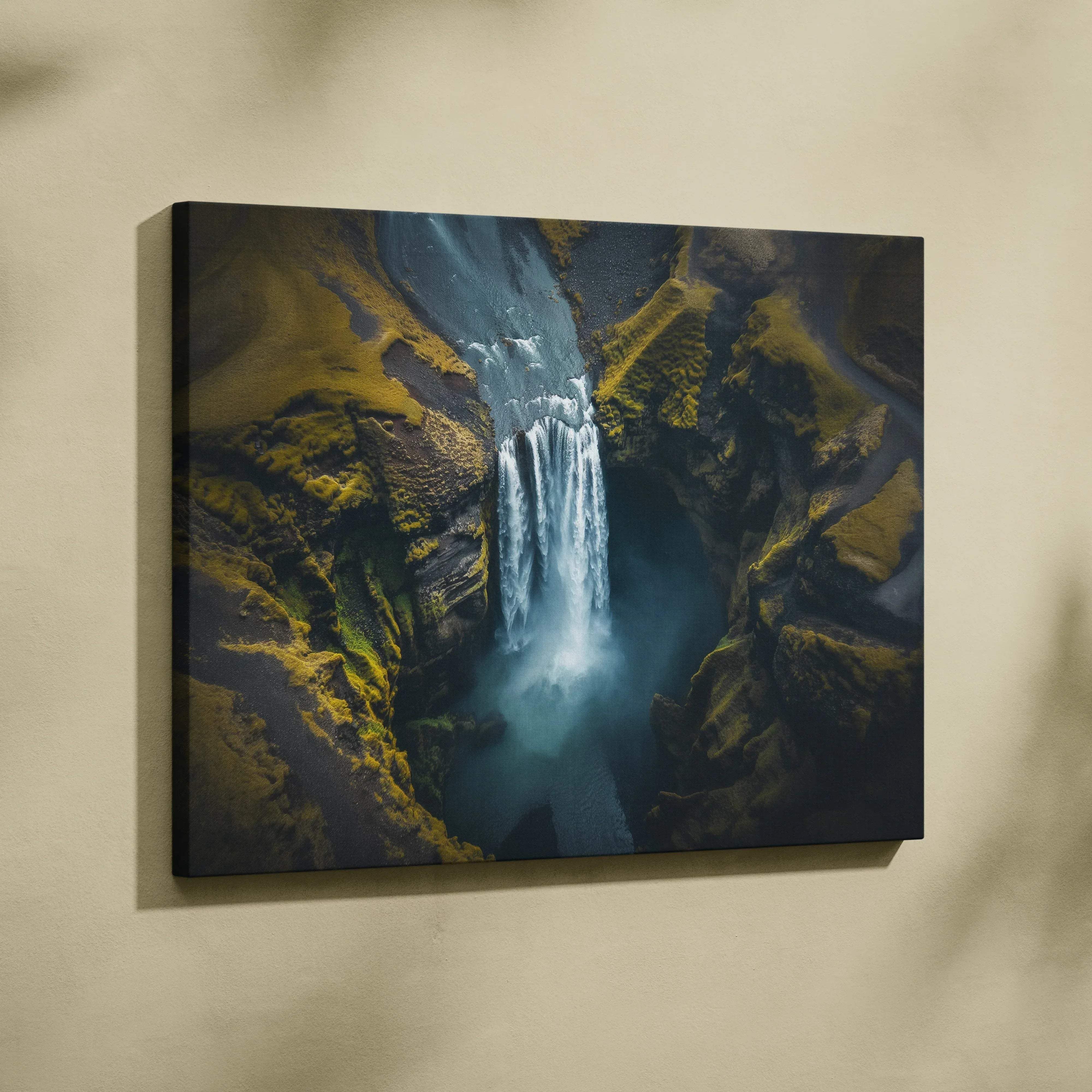 Rectangular canvas print of a dramatic aerial view waterfall with mossy cliffs in blues and greens for serene nature decor