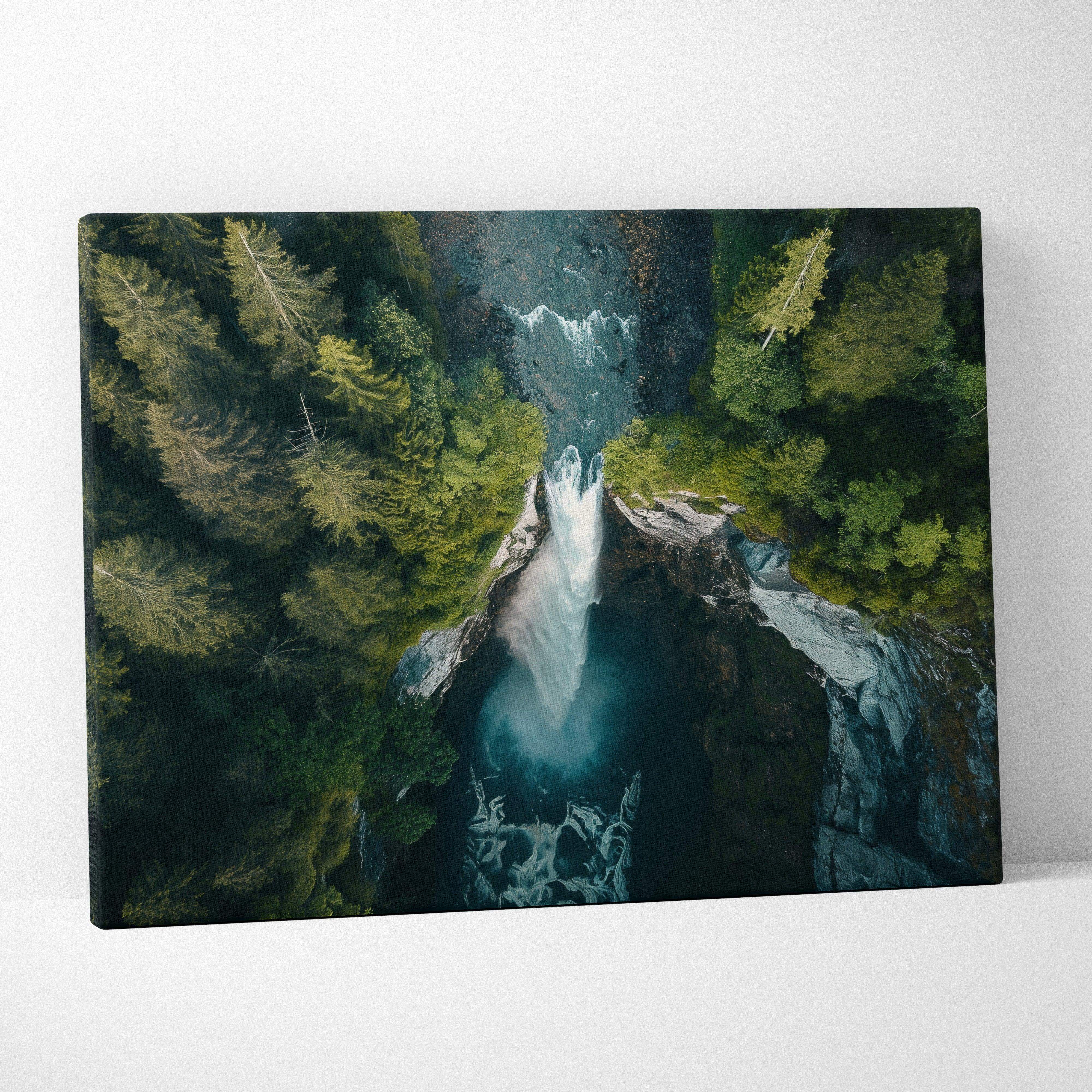 Aerial view canvas print of an emerald green forest waterfall with rocky cliffs and mist for living room decor