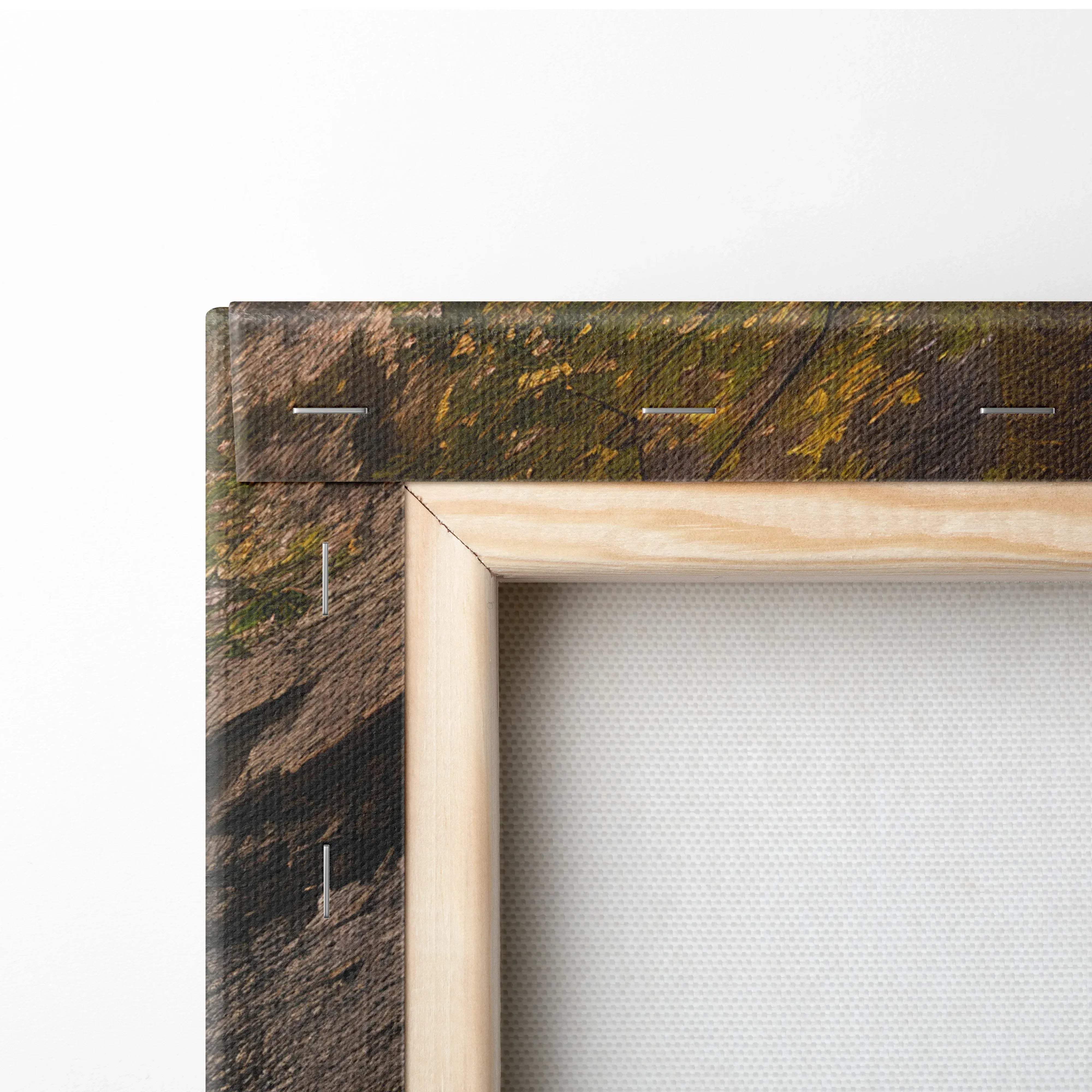 Light-colored wooden frame holding an earthy-toned textured canvas of autumn light waterfall with stone stair path forest art