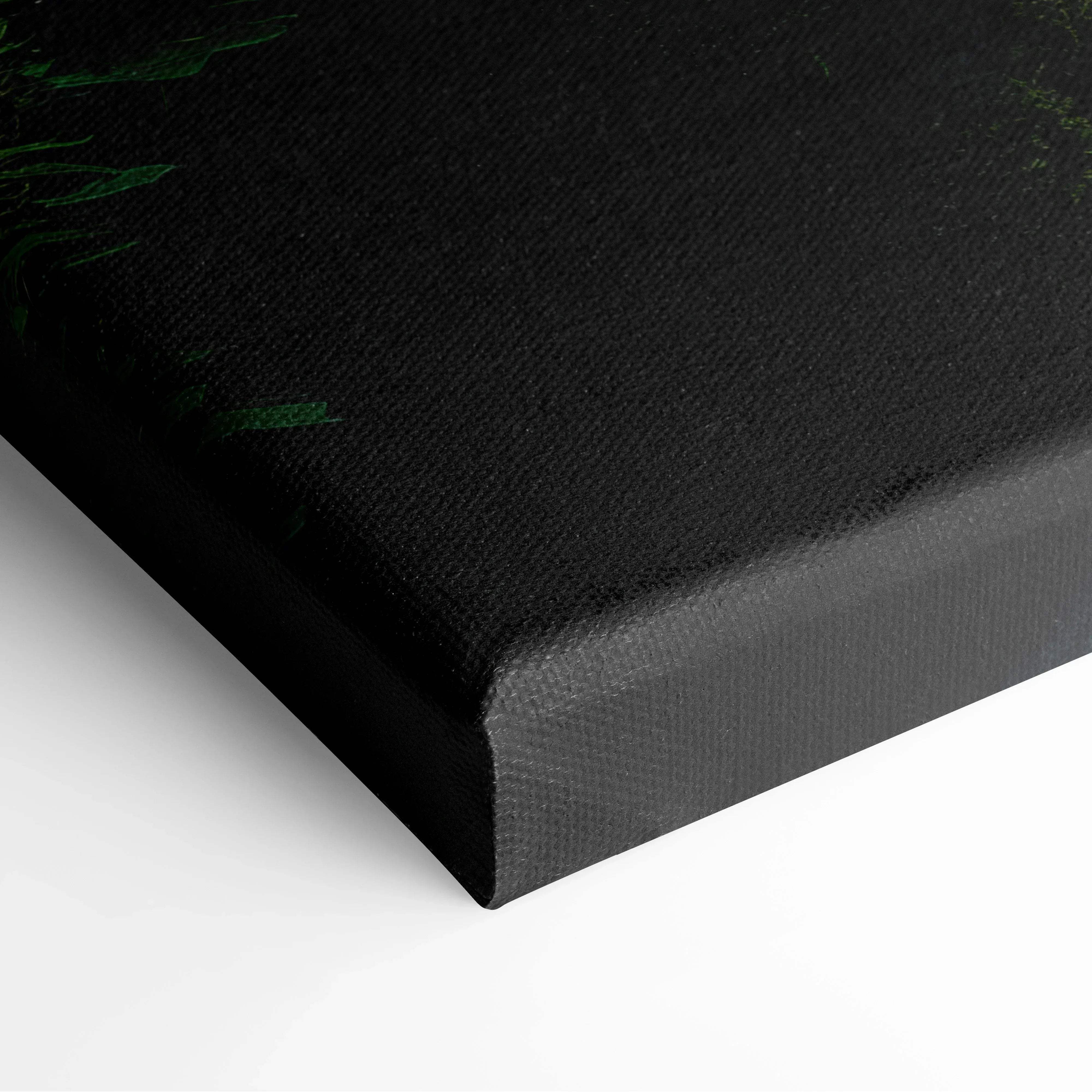 Black canvas print with textured surface and subtle green foliage accents in sunlit waterfall forest design