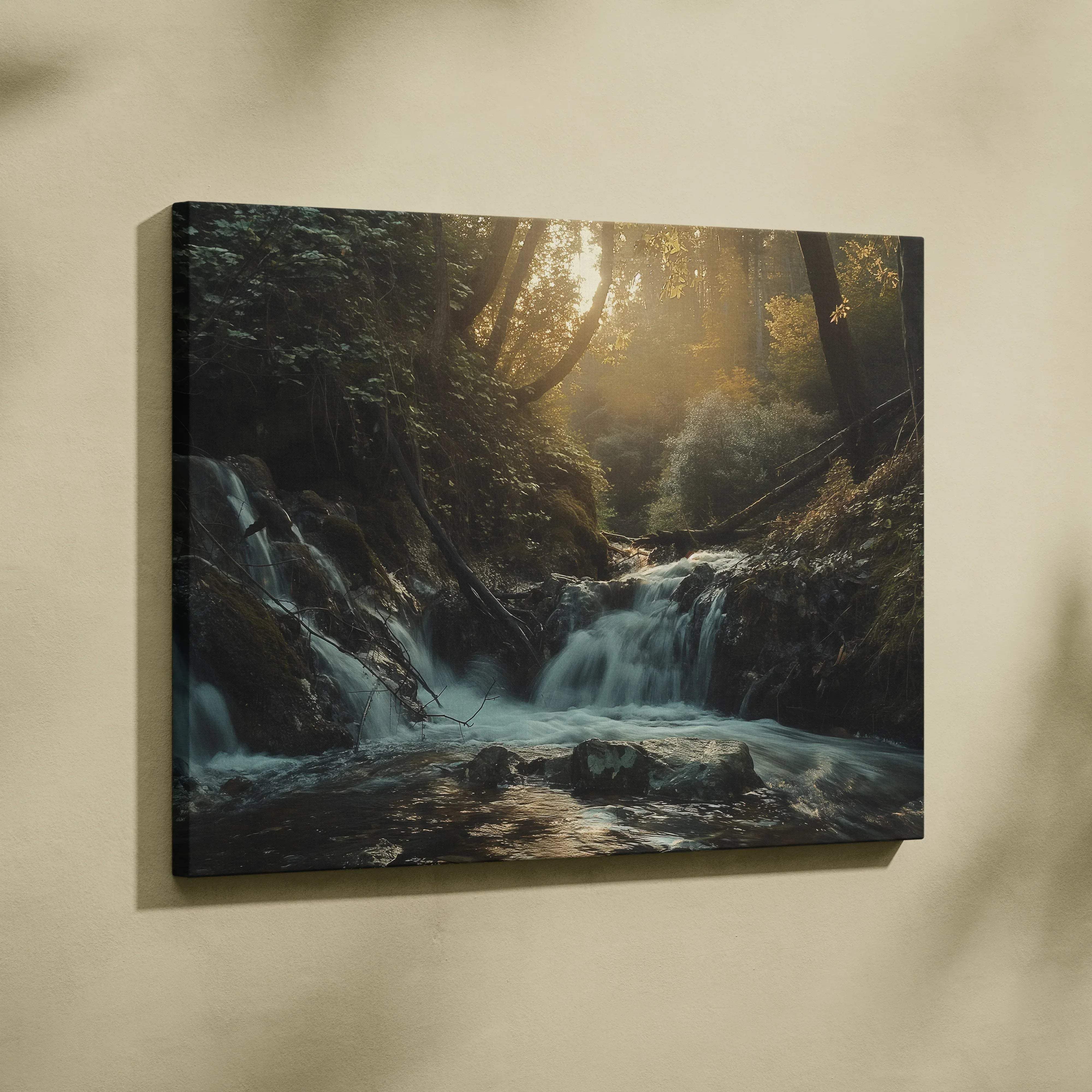 Framed canvas print of a tranquil forest waterfall with golden sunlight filtering through trees for wall decor