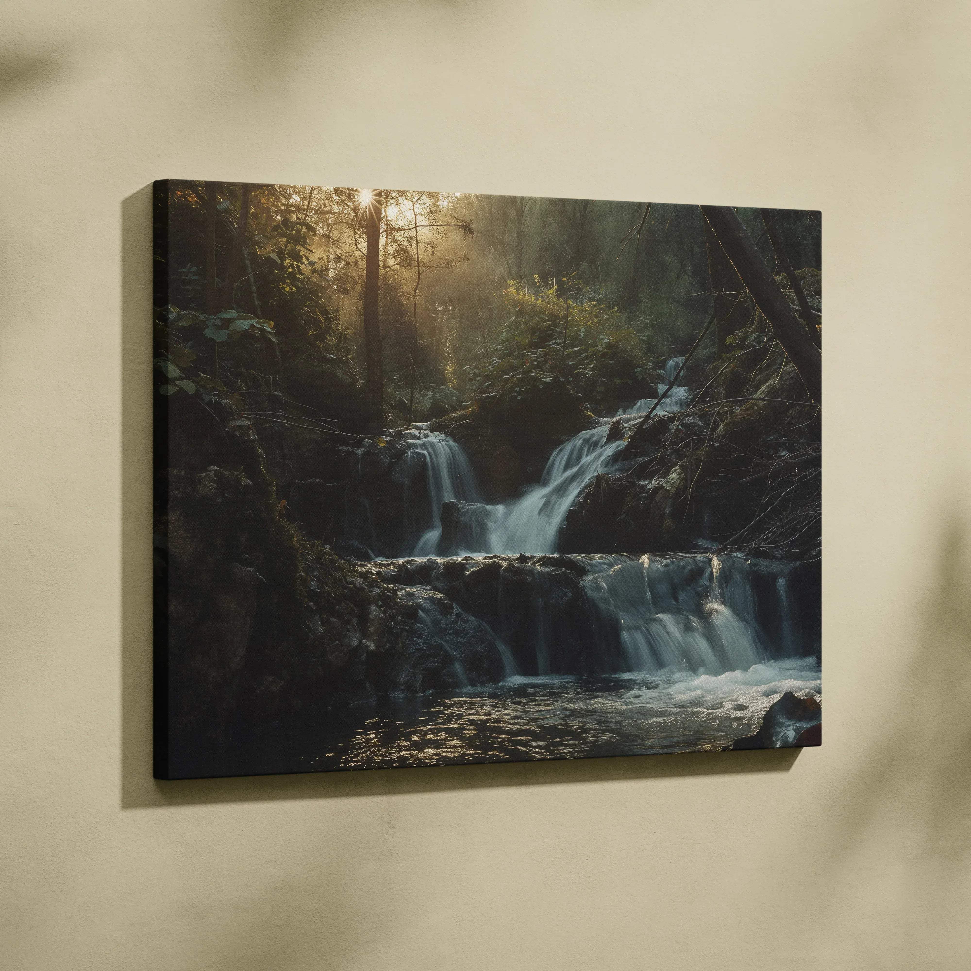 Canvas print of a cascading waterfall in a sun-dappled forest with warm sunlit greens and browns for living room decor