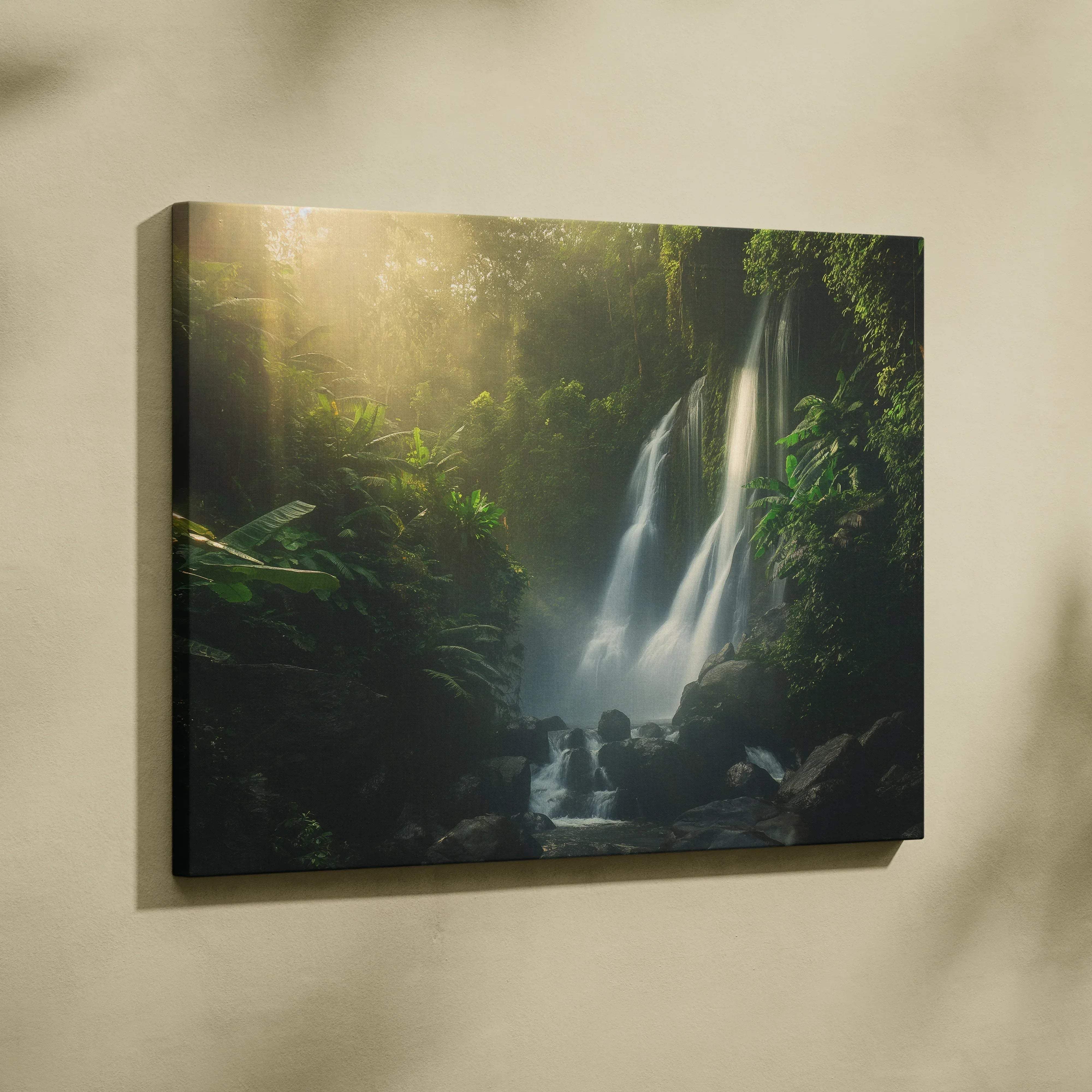 Rectangular canvas wall art featuring a lush green jungle waterfall scene with golden sunlight filtering through foliage