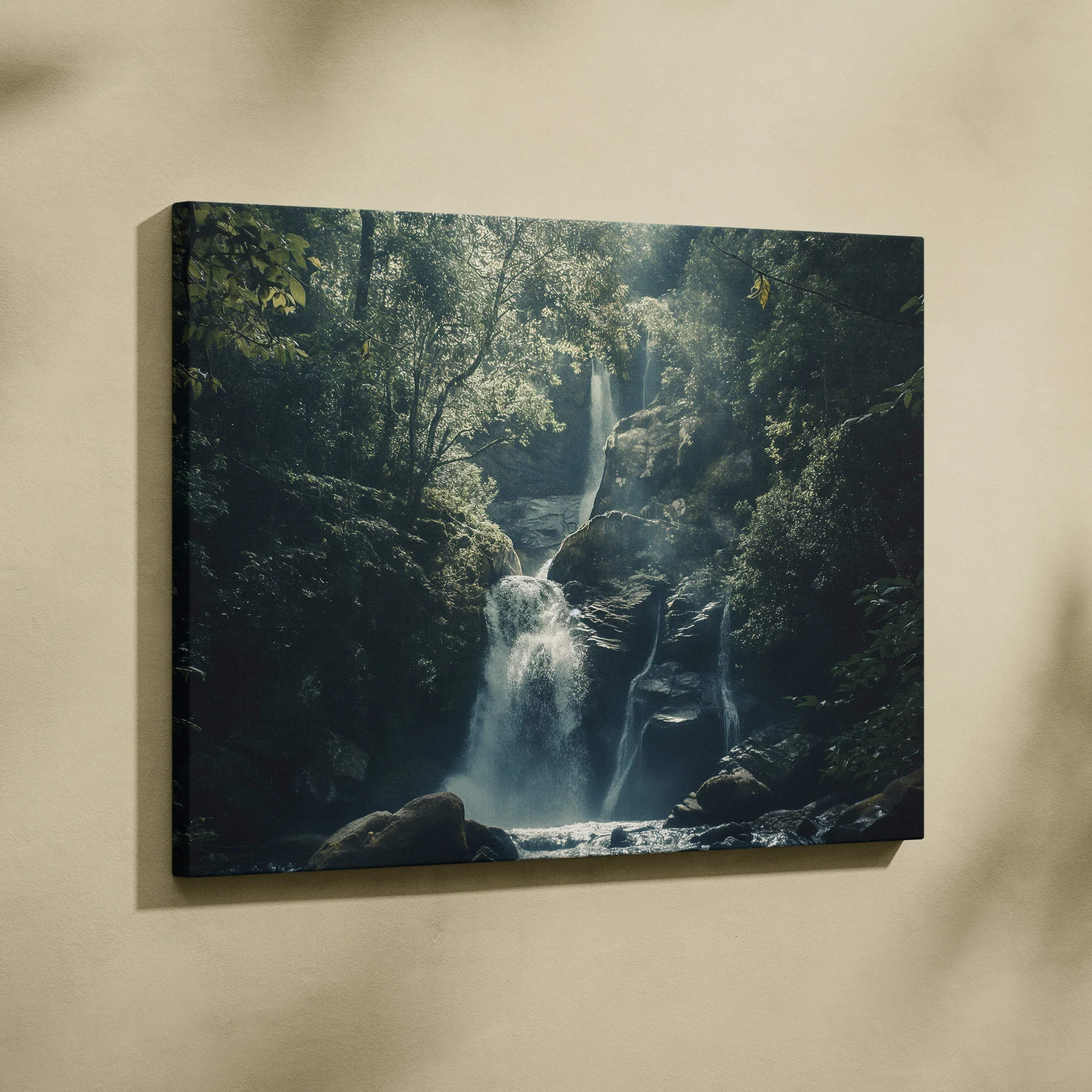 A framed canvas wall art of a cascading waterfall with lush green foliage and sunlight filtering through trees