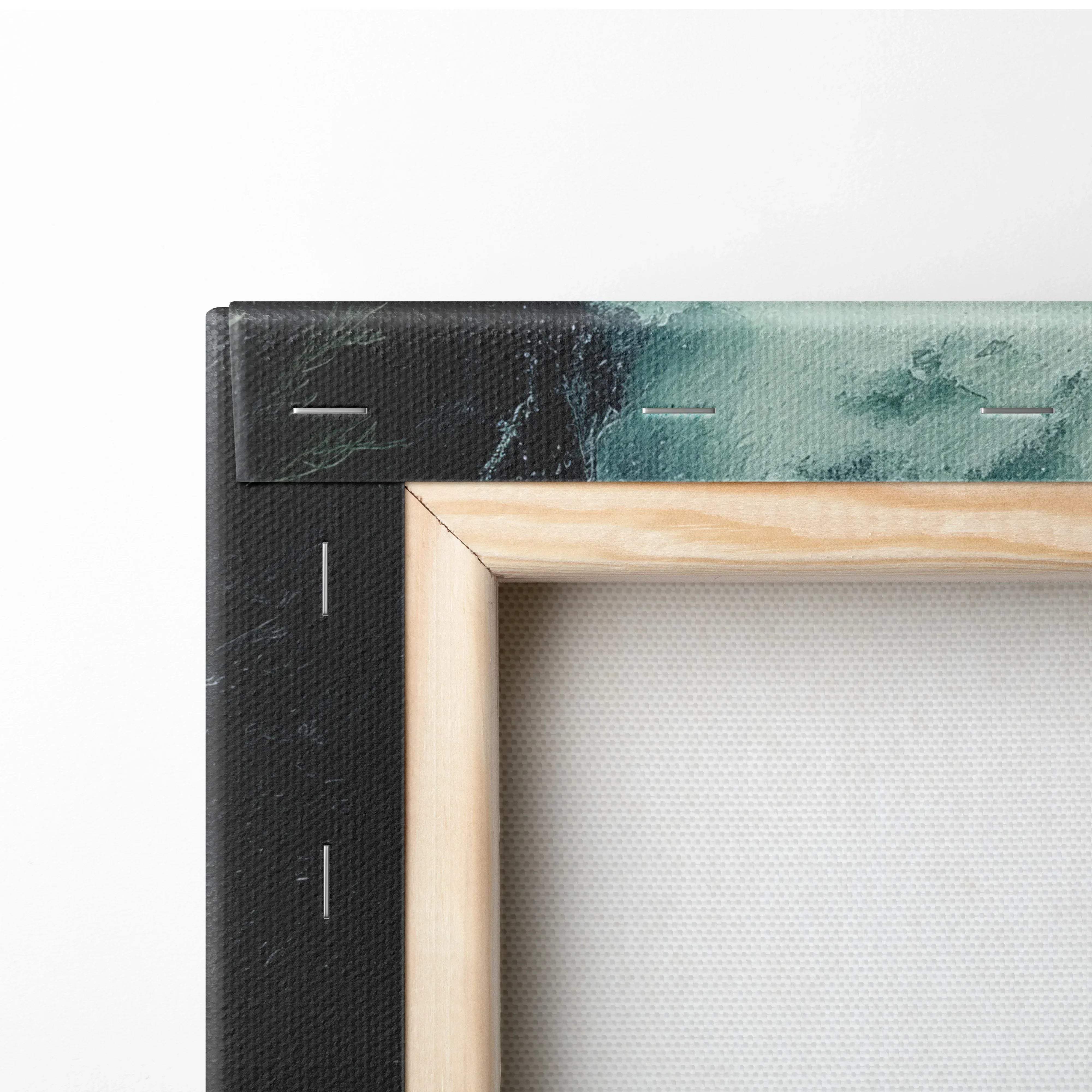 A minimalist canvas print featuring a textured teal and black abstract design framed by light wood with black fabric backing