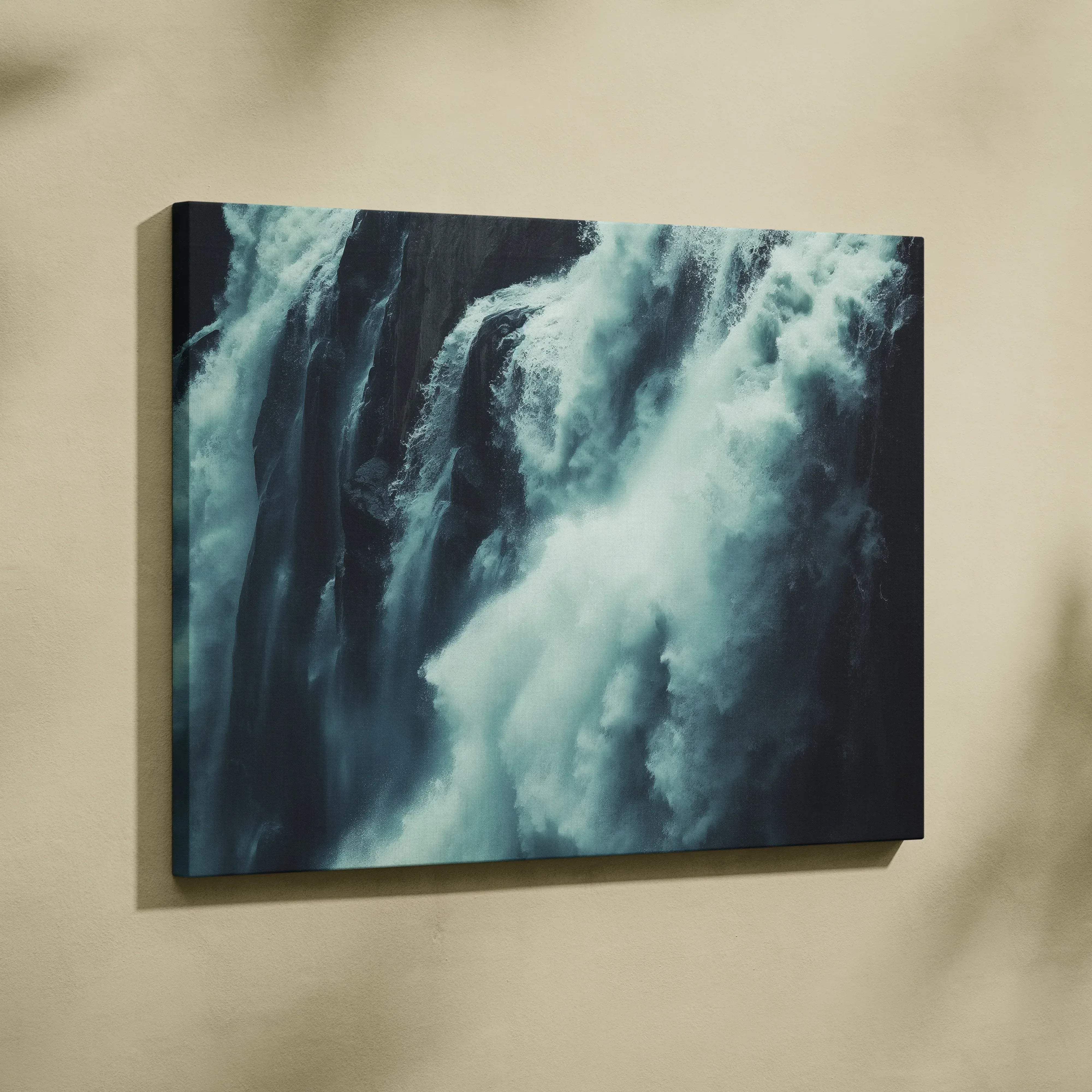 Rectangular canvas print of a moody teal blues swirling waterfall with rushing water nature decor print