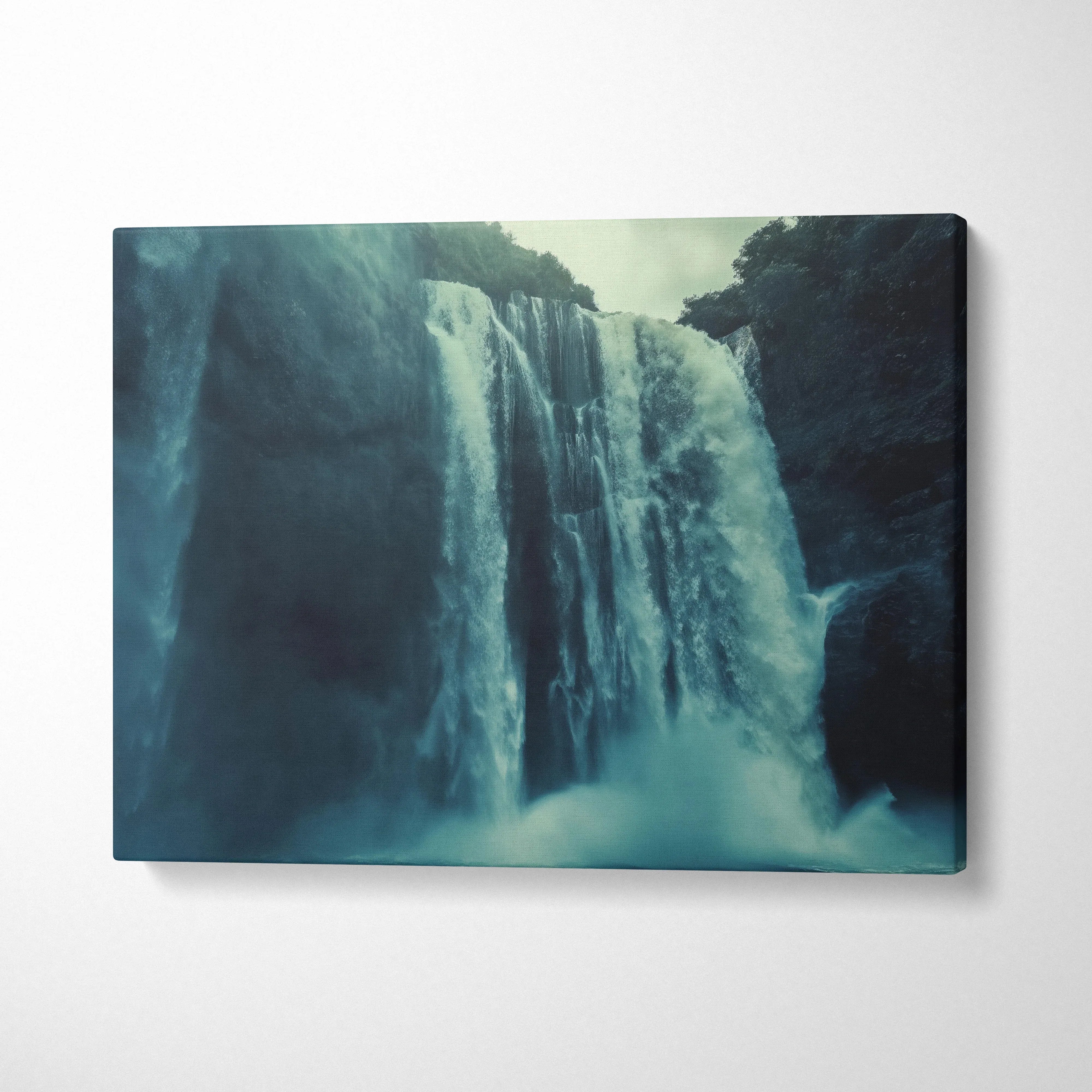 Waterfall nature scene canvas wall art with misty blue tones for home decor.